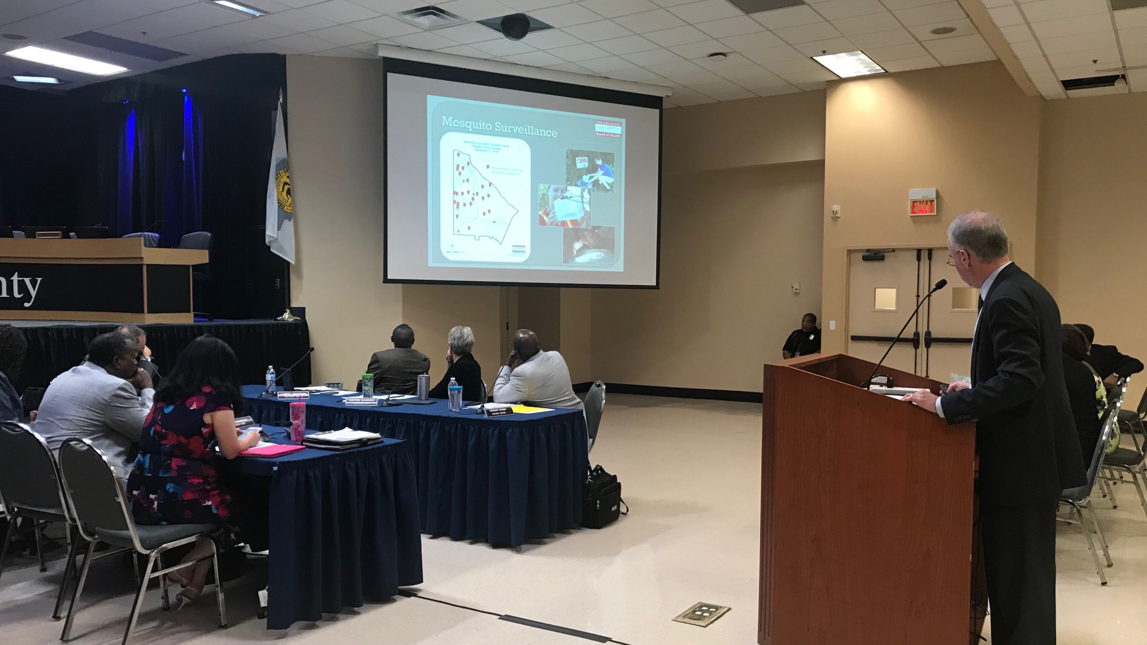 Ryan Cira, environmental health director for the DeKalb Board of Health, briefs the Board of Commissioners on mosquito-borne diseases on Sept. 18, 2018. TIA MITCHELL/TIA.MITCHELL@AJC.COM