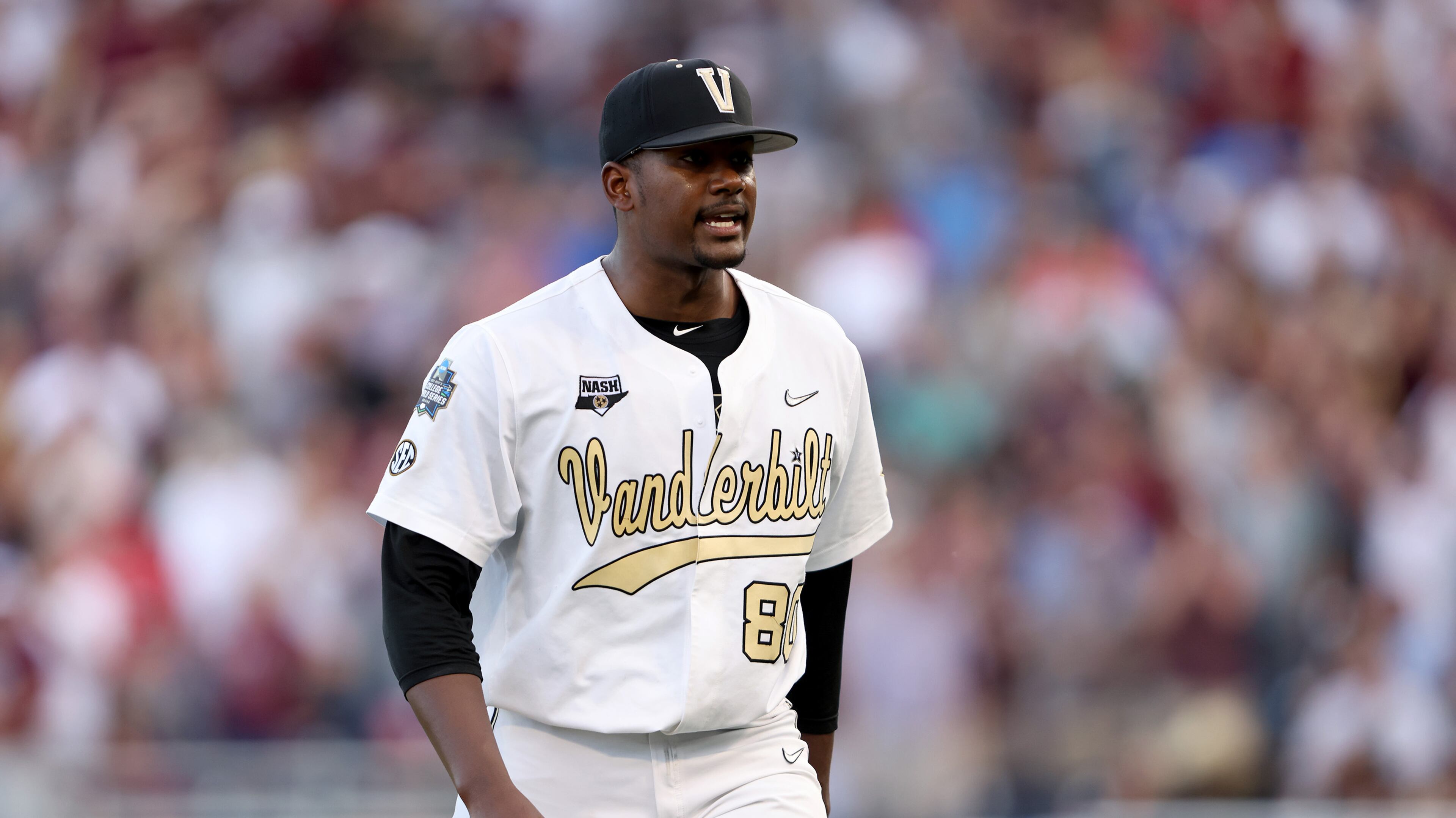 Starting pitcher Kumar Rocker (80) of Vanderbilt reacts to being pulled from the game against Mississippi State by head coach Tim Corbin in the top of the fifth inning during game three of the College World Series Championship at TD Ameritrade Park Omaha on June 30, 2021 in Omaha, Nebraska. (Sean M. Haffey/Getty Images/TNS)