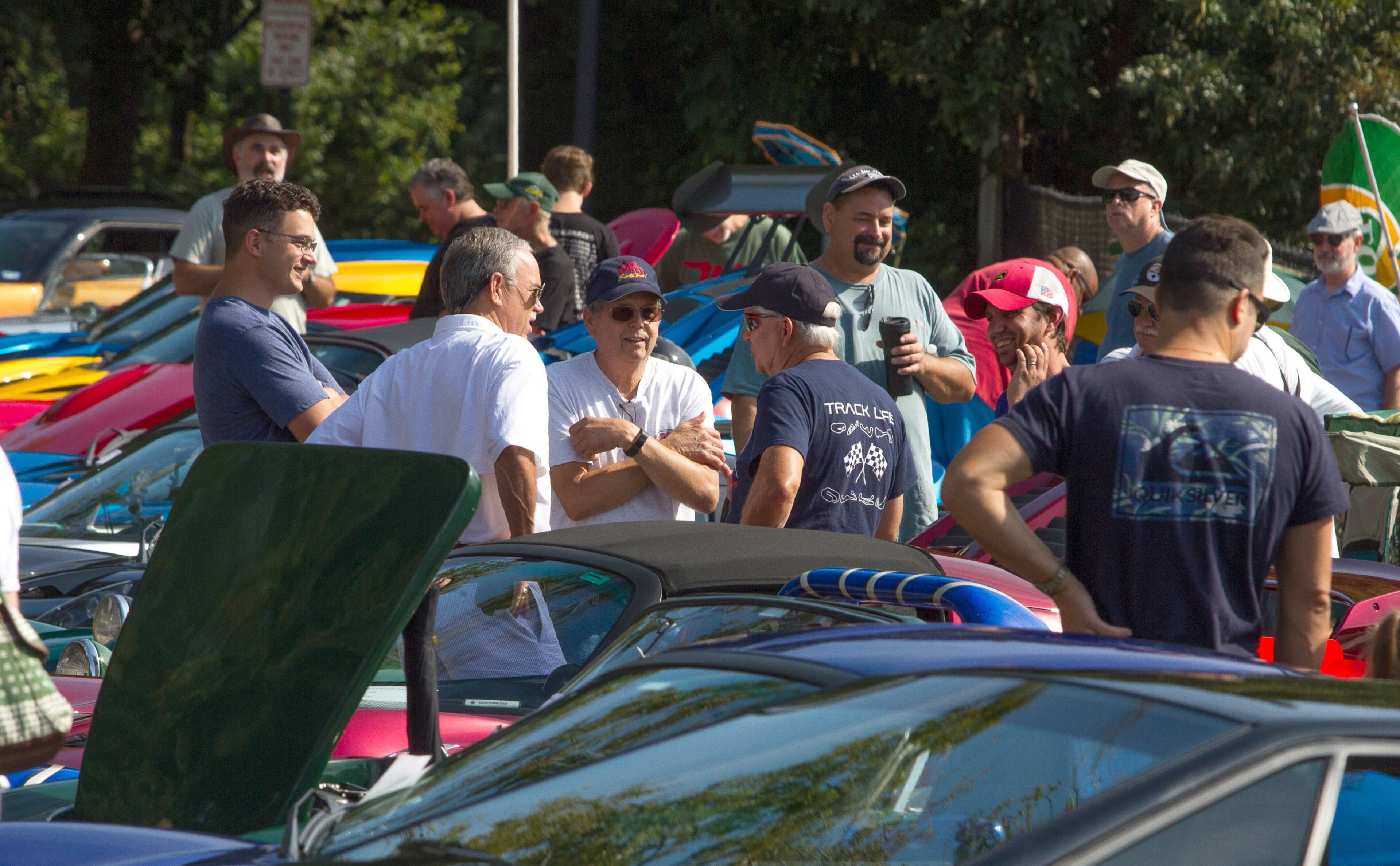 A crowd looks over some of the British automobiles at the 8th annual Atlanta British Car Fayre in downtown Norcross on Saturday, Sept. 8, 2018. (Photo: STEVE SCHAEFER / SPECIAL TO THE AJC)