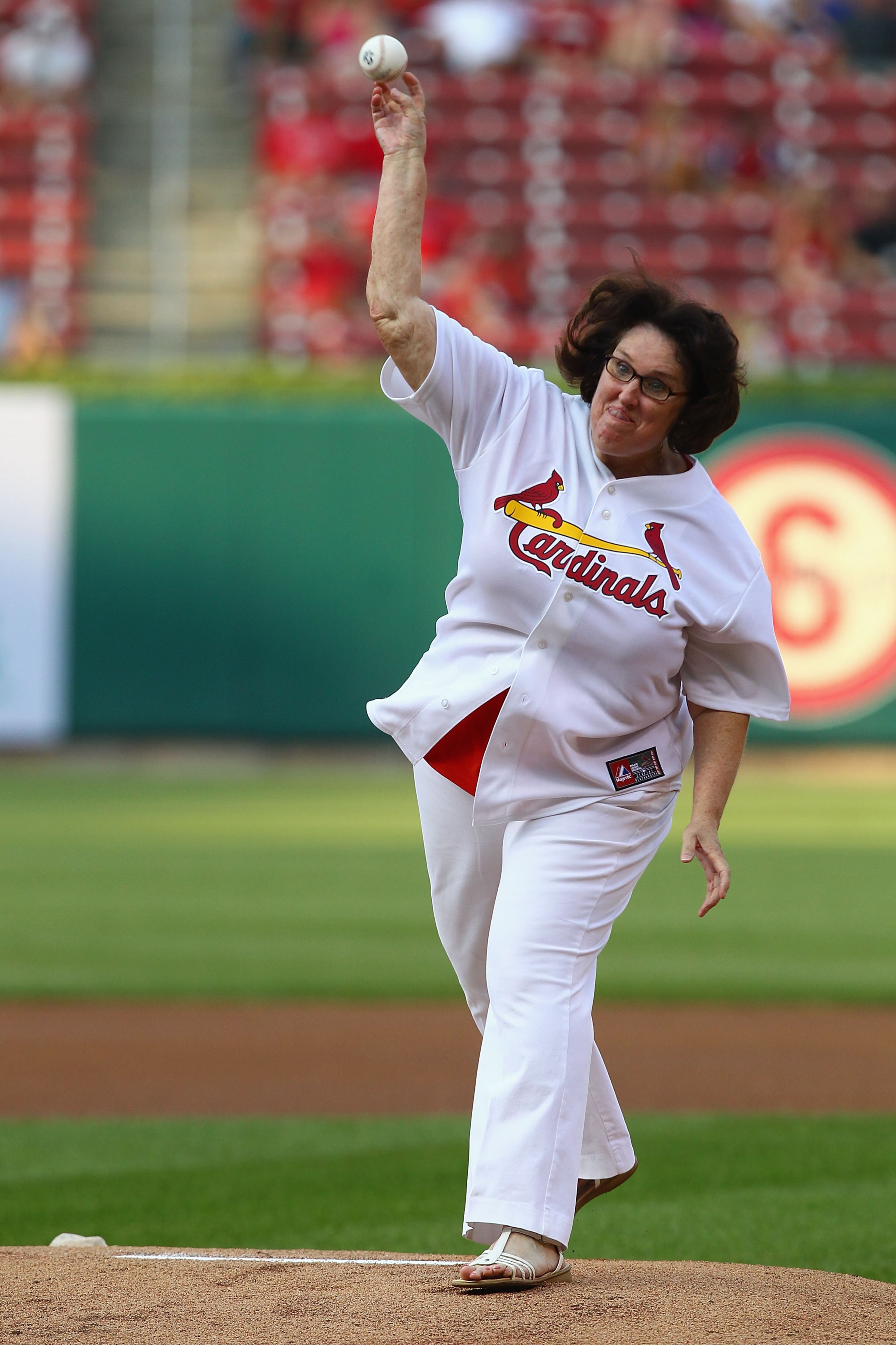 Actress Phyllis Smith throws out the first pitch prior to a game between the St. Louis Cardinals and the Houston Astros at Busch Stadium on July 9, 2013 in St. Louis, Missouri. The Cardinals beat the Astros 9-5.