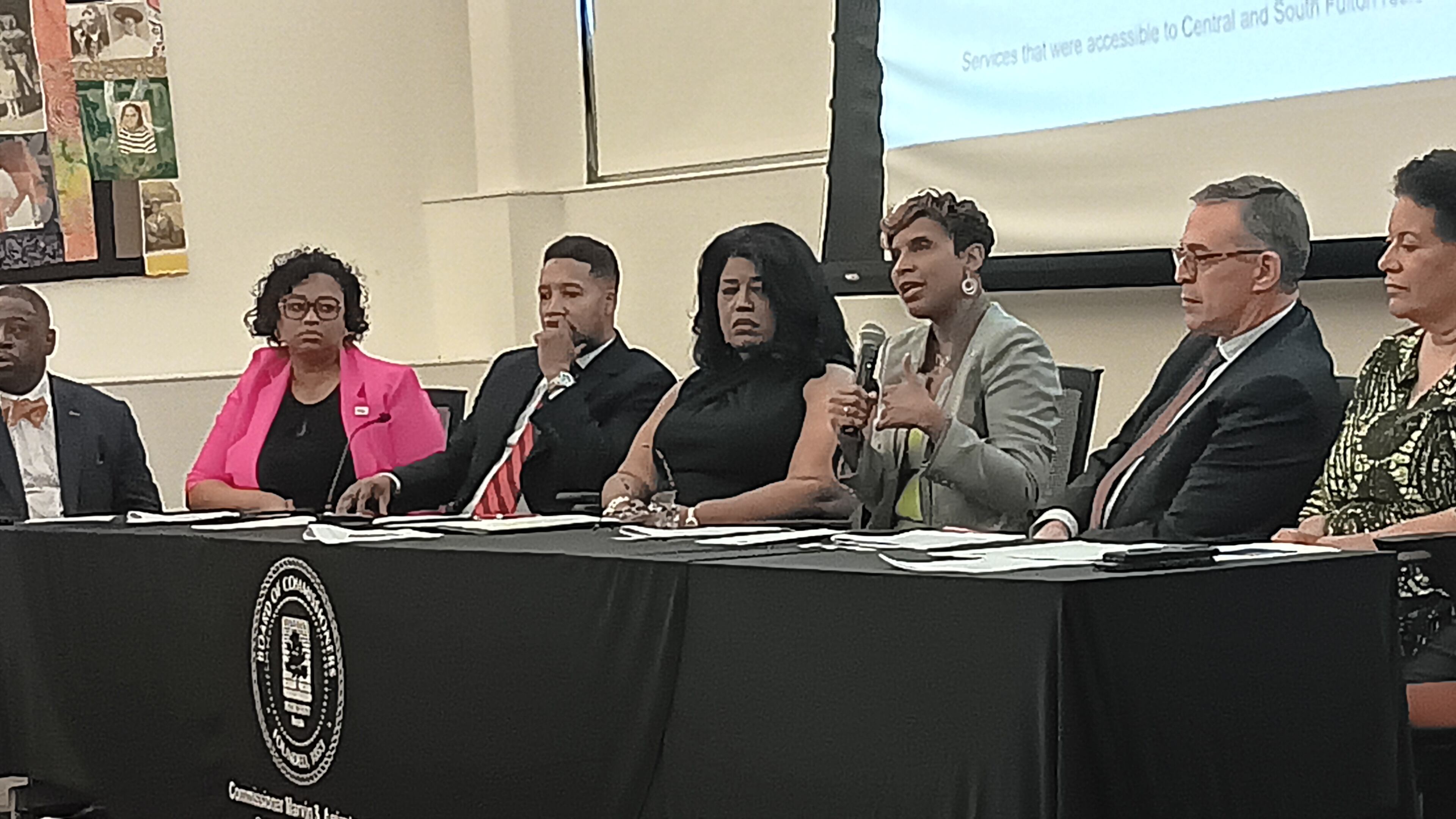 Panelists from Grady Health System, Fulton County and cities in south Fulton talk about health inequity at a town hall April 18, 2024. Jim Gaines/jim.gaines@ajc.com