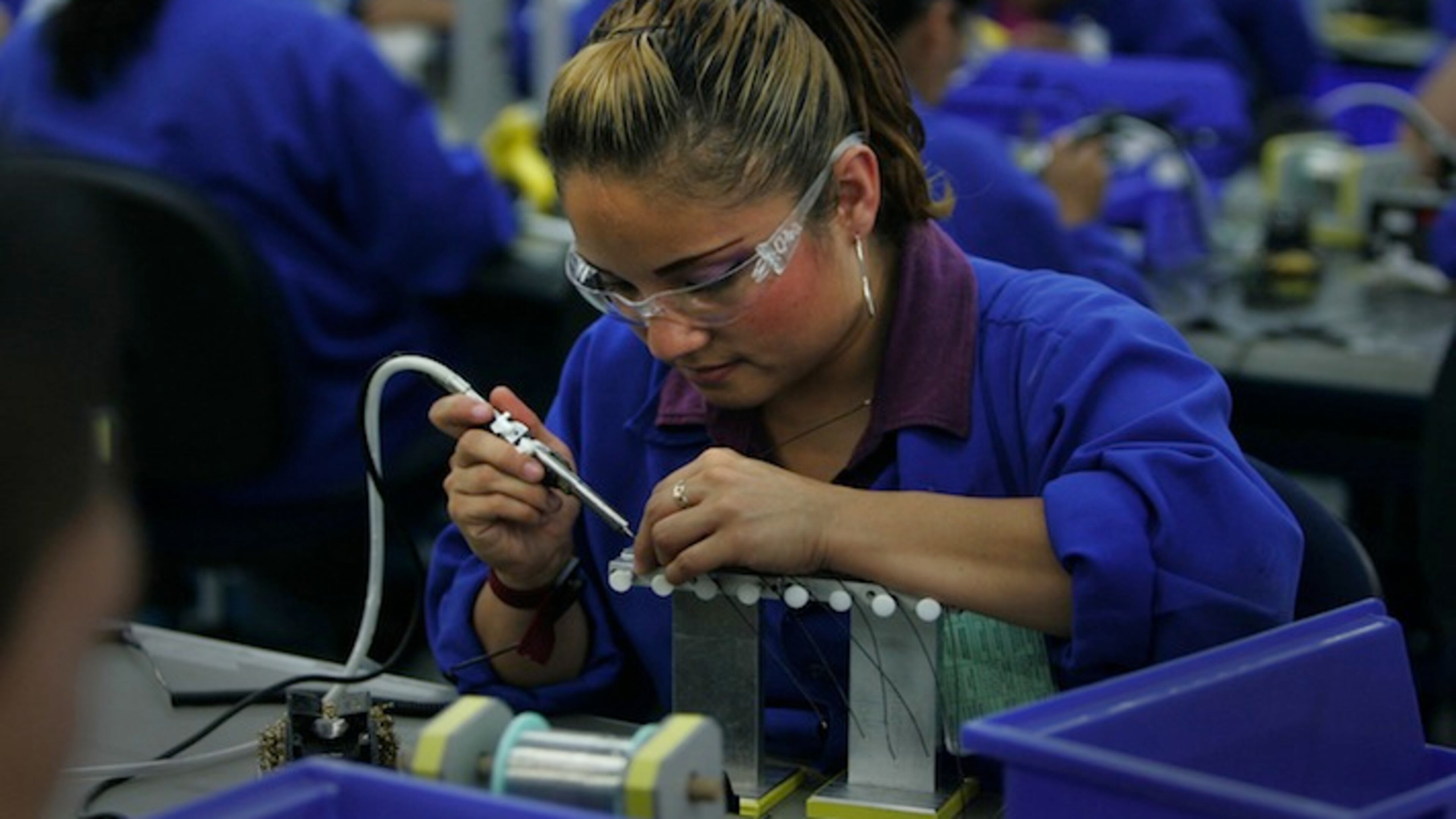 Communication headsets are made at Plantronics, a maquiladora in Tijuana, Mexico. (Peggy Peattie/San Diego Union-Tribune/TNS)
