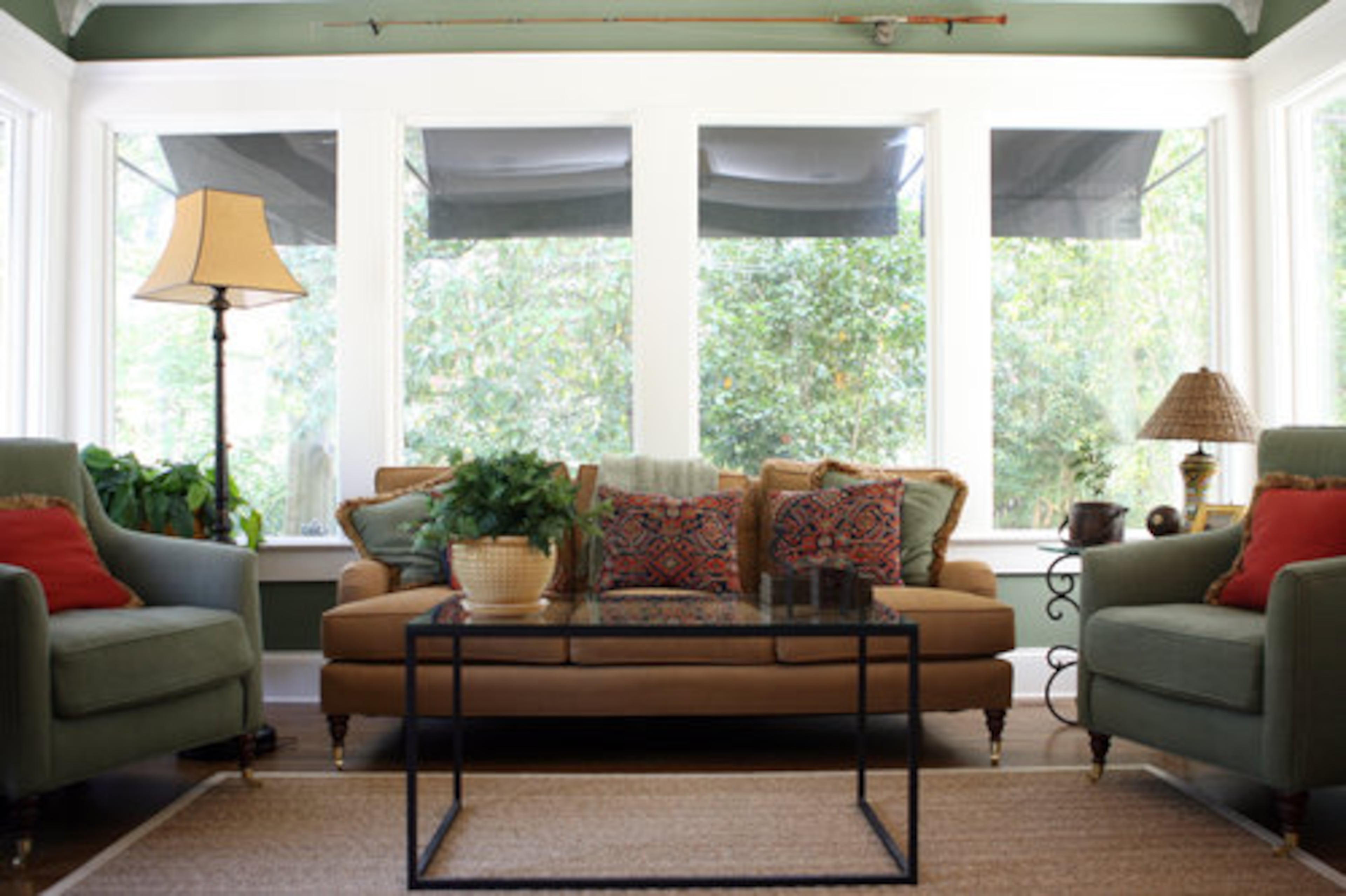 The sunroom in Gibbs' home features a fishing pole mounted to the wall.