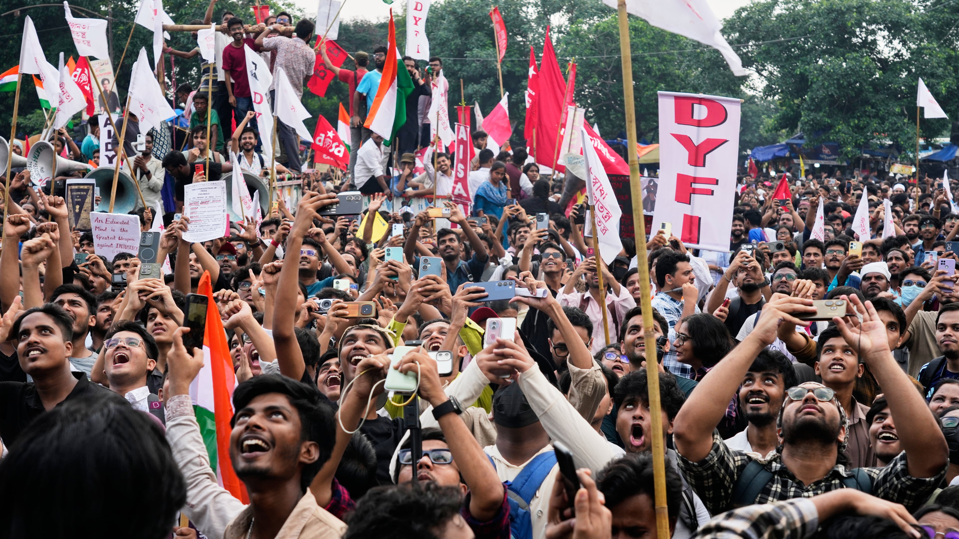 Student wing activists of different political parties join in a rally demanding educational reforms as part of the Cockroach Janta Party's ongoing protest movement, in Kolkata, India, Friday, July 24, 2026. (AP Photo/Bikas Das)