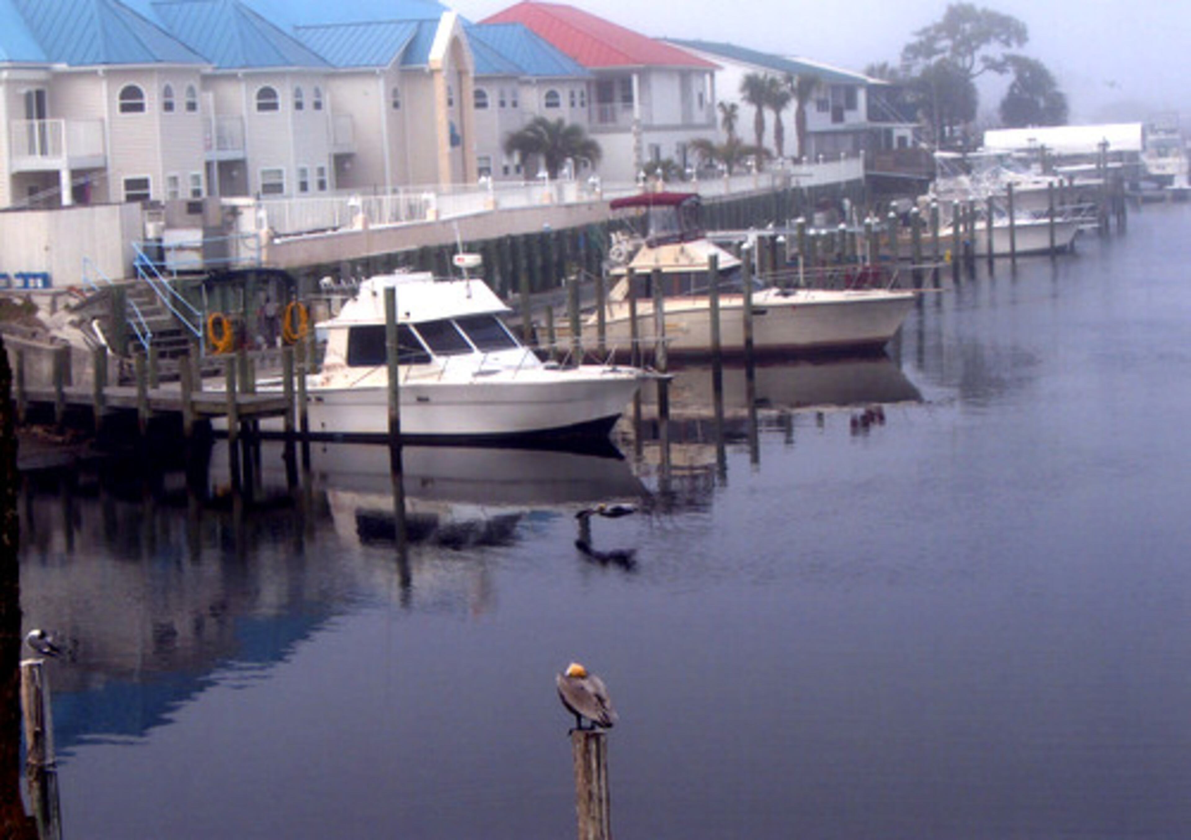 Condos and townhouses line the canal in Mexico Beach, Fla. Vacationers can rent many of them, along with slips for their boats.