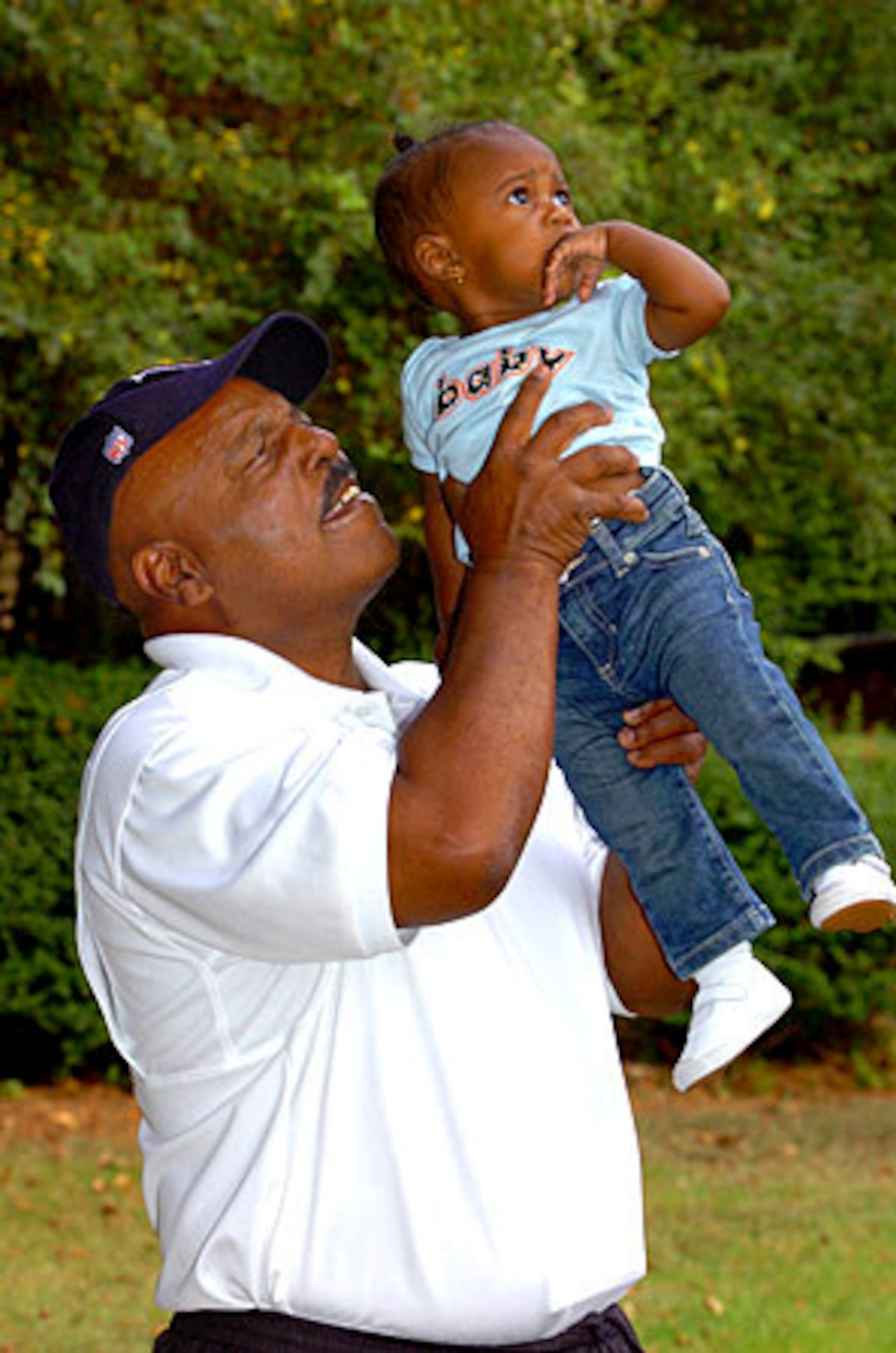 Coach Godfrey? Is a doting grandfather to 10-month-old Bailey Sky.