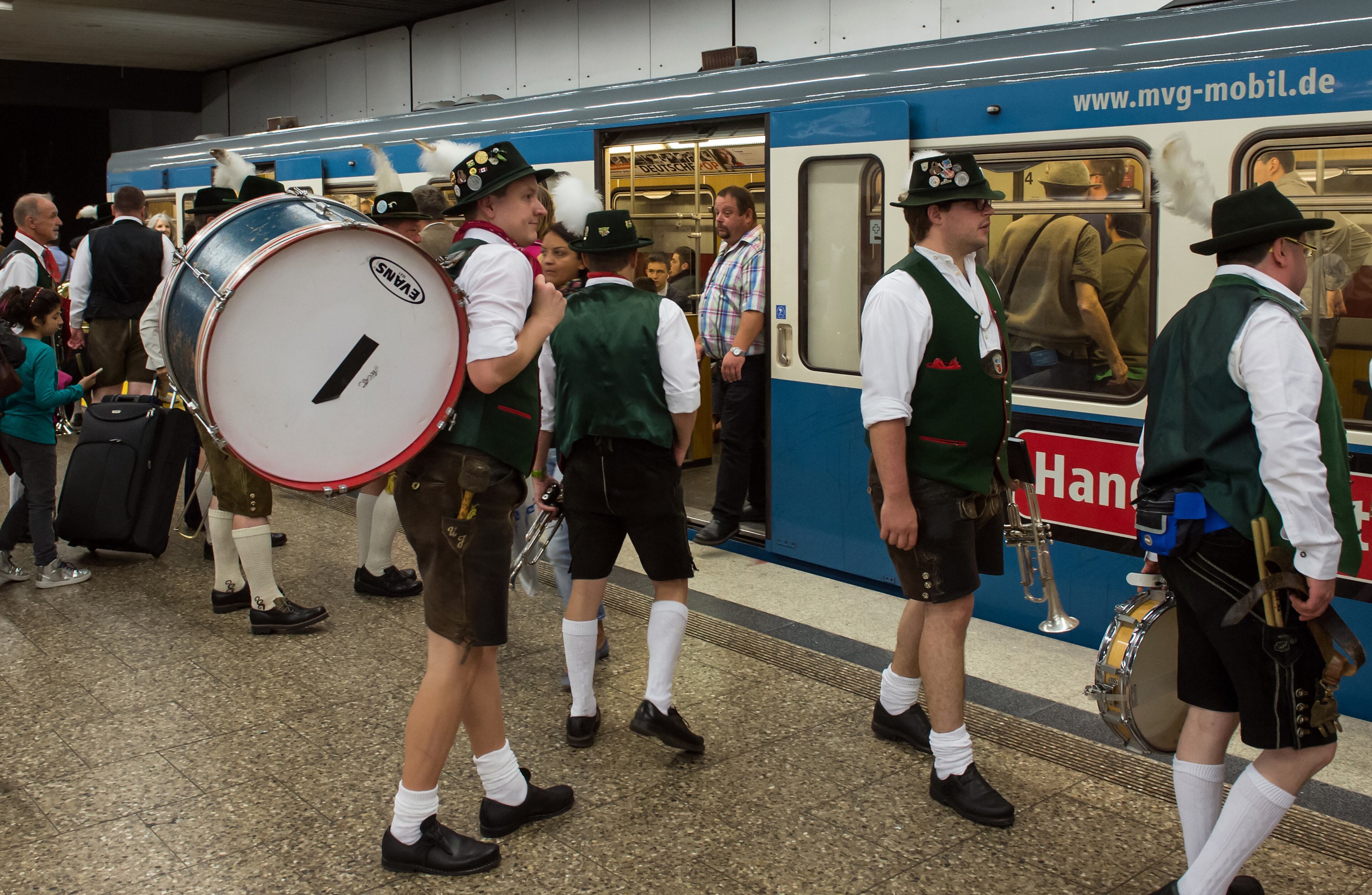 MUNICH, GERMANY - SEPTEMBER 20: Members of the traditional bavarian marching band 'Oktoberfest-Kapelle Karl Flauger' enters underground to go to Oktoberfest 2014 on September 20, 2014 in Munich, Germany. Oktoberfest is the world's biggest beer bash and draws millions of visitors. The annual event lasts for three weeks and will open its doors on September 20. (Photo by Joerg Koch/Getty Images)