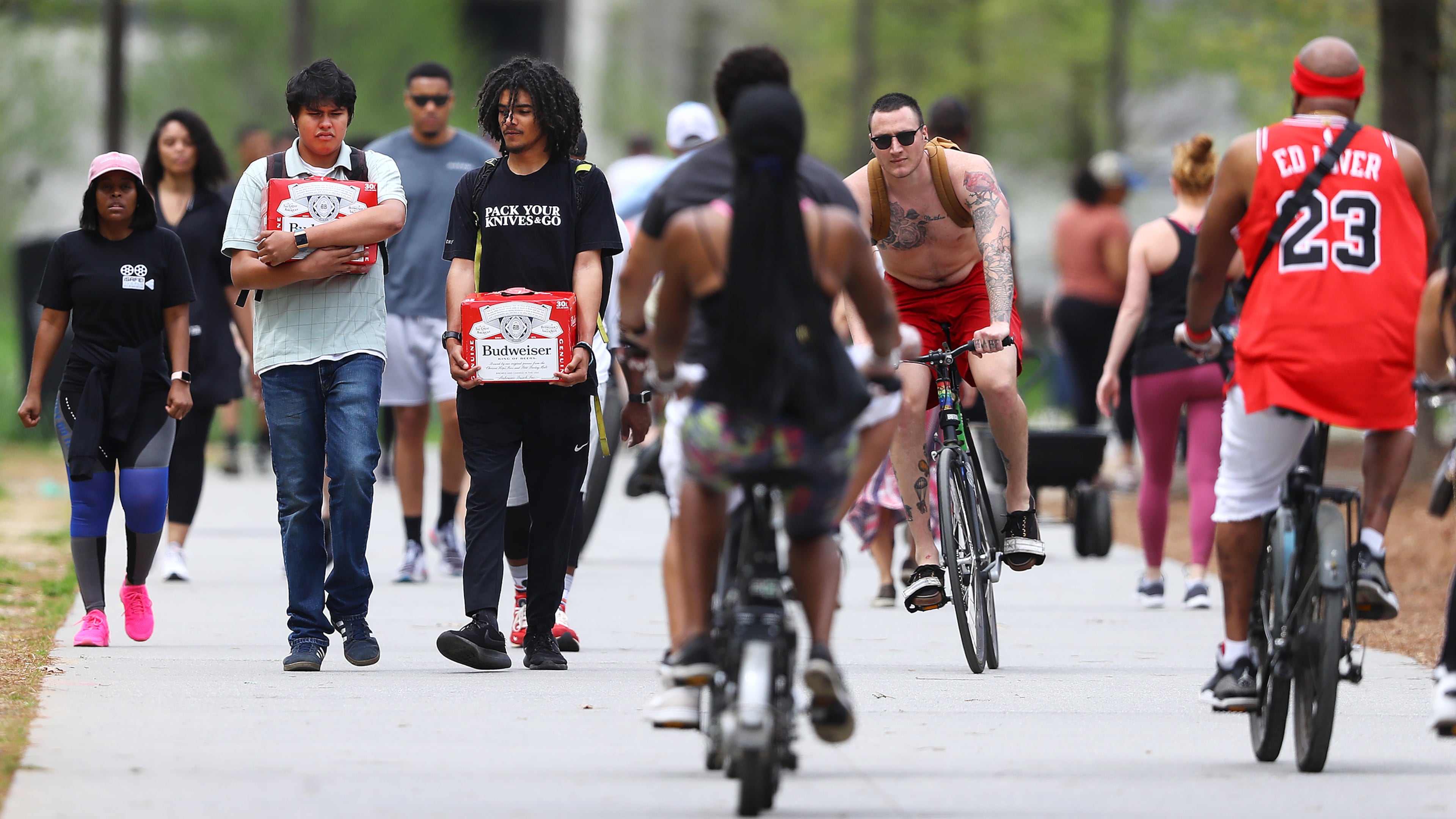 An afternoon in March 2020 with walkers and riders competing for limited path space on the Atlanta Beltline. (Curtis Compton/AJC)