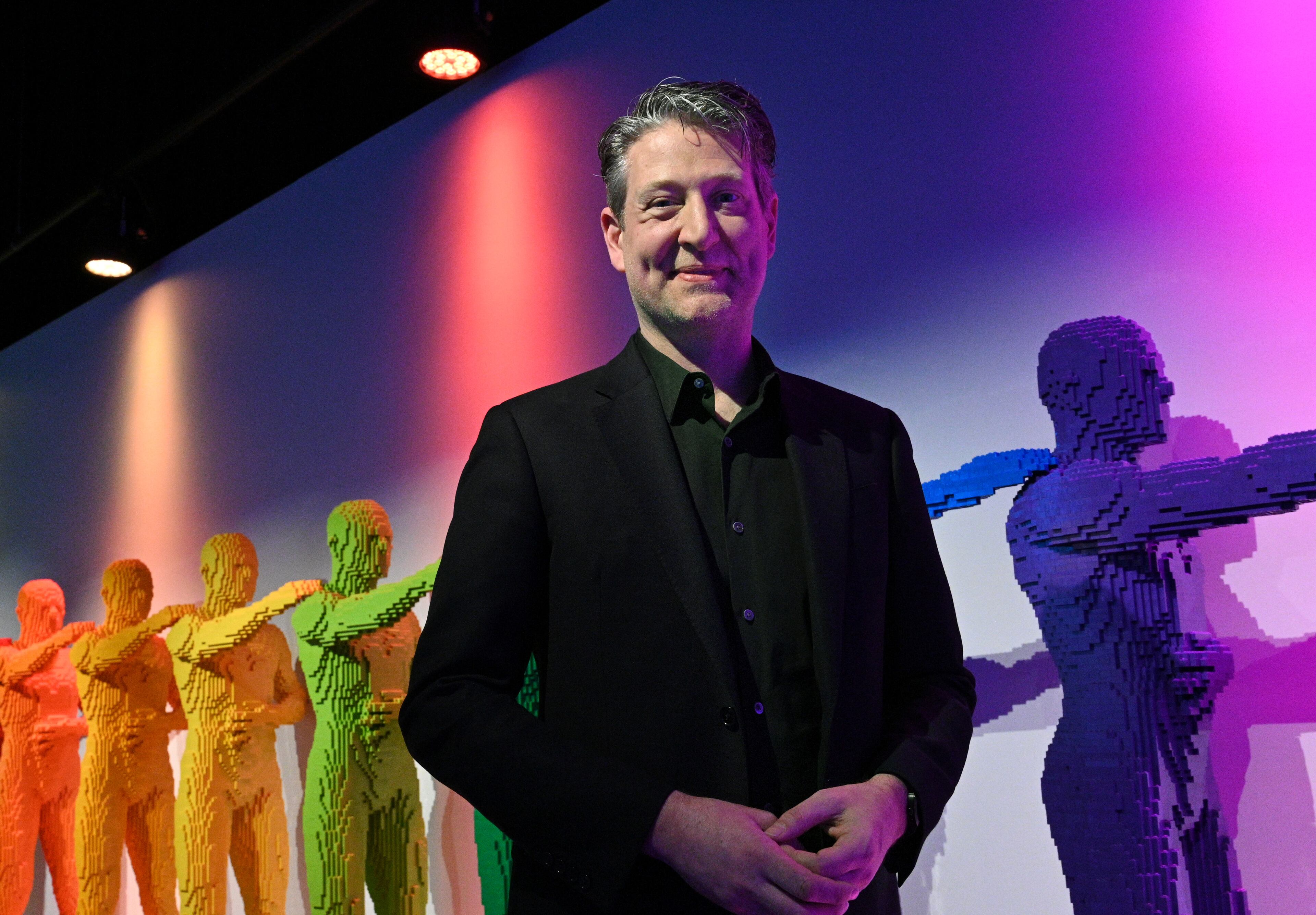 Portrait of LEGO artist Nathan Sawaya, at his "Art of the Brick Immersive Experience" exhibition at Exhibition Hub Atlanta Art Centre, Wednesday, April 19, 2023, in Doraville. The exhibition will feature many pieces and themes, including a room with oversized sculptures (25-foot long), over 70 works of art crafted from more than 1 million LEGO bricks, galleries celebrating human-kind and nature, and a short documentary about how Nathan creates his works. (Hyosub Shin / Hyosub.Shin@ajc.com)