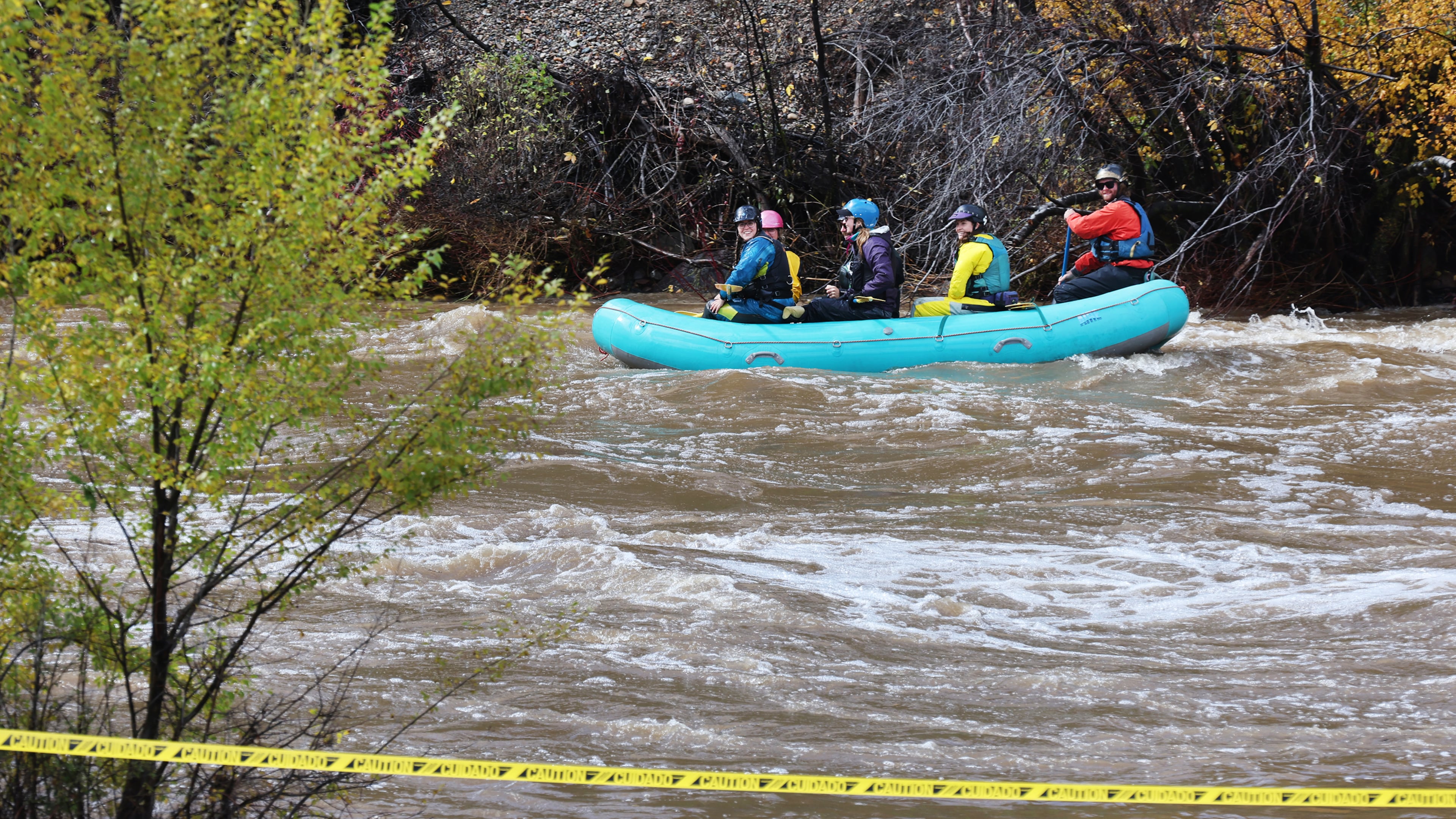 Rafters make their way down a closed Animas River Saturday, Oct. 24, 2026, in Durango, Colo. (Jerry McBride/The Durango Herald via AP)