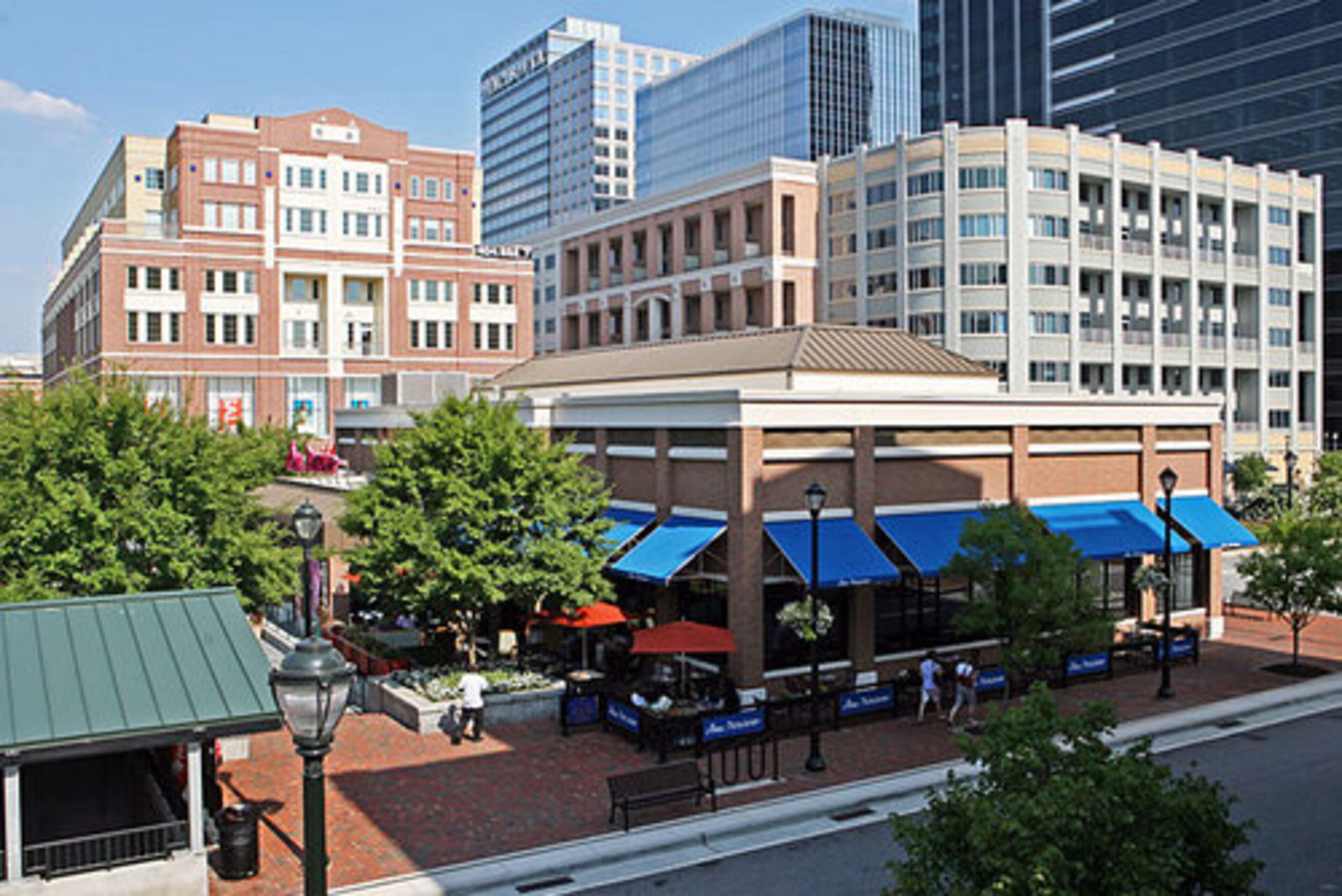Central Park at Atlantic Station, surrounded by a mix of restaurant, retail, office and residential space. Once the "it" kind of development, mixed use -- live, work, play -- developments seem to have hit the market at precisely the wrong time.