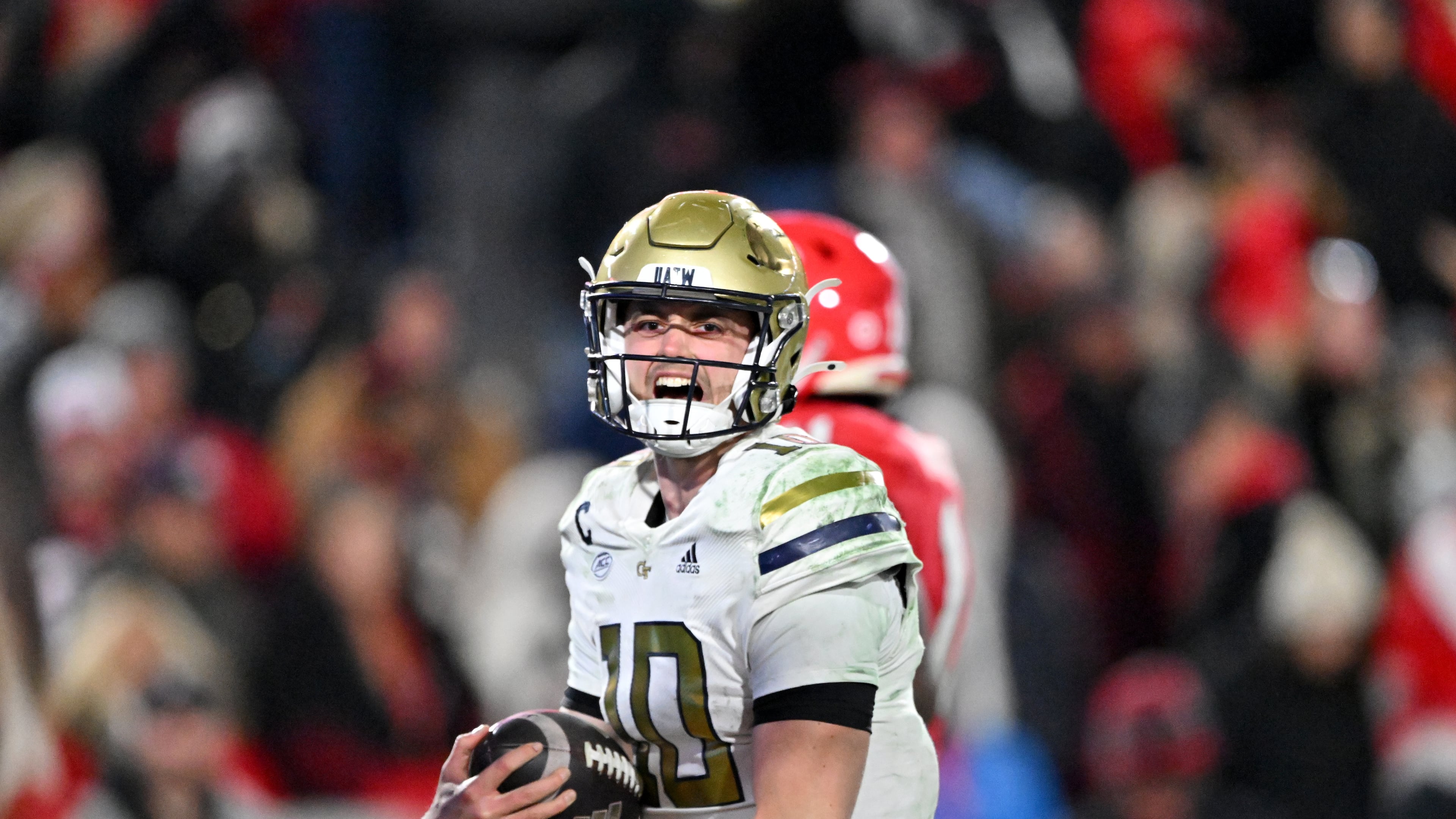 Georgia Tech quarterback Haynes King (10) celebrates after scoring a touchdown during the fourth quarter in an NCAA football game at Sanford Stadium, Friday, November 29, 2024, in Athens. Georgia won 44-42 in eight overtimes. (Hyosub Shin / AJC)