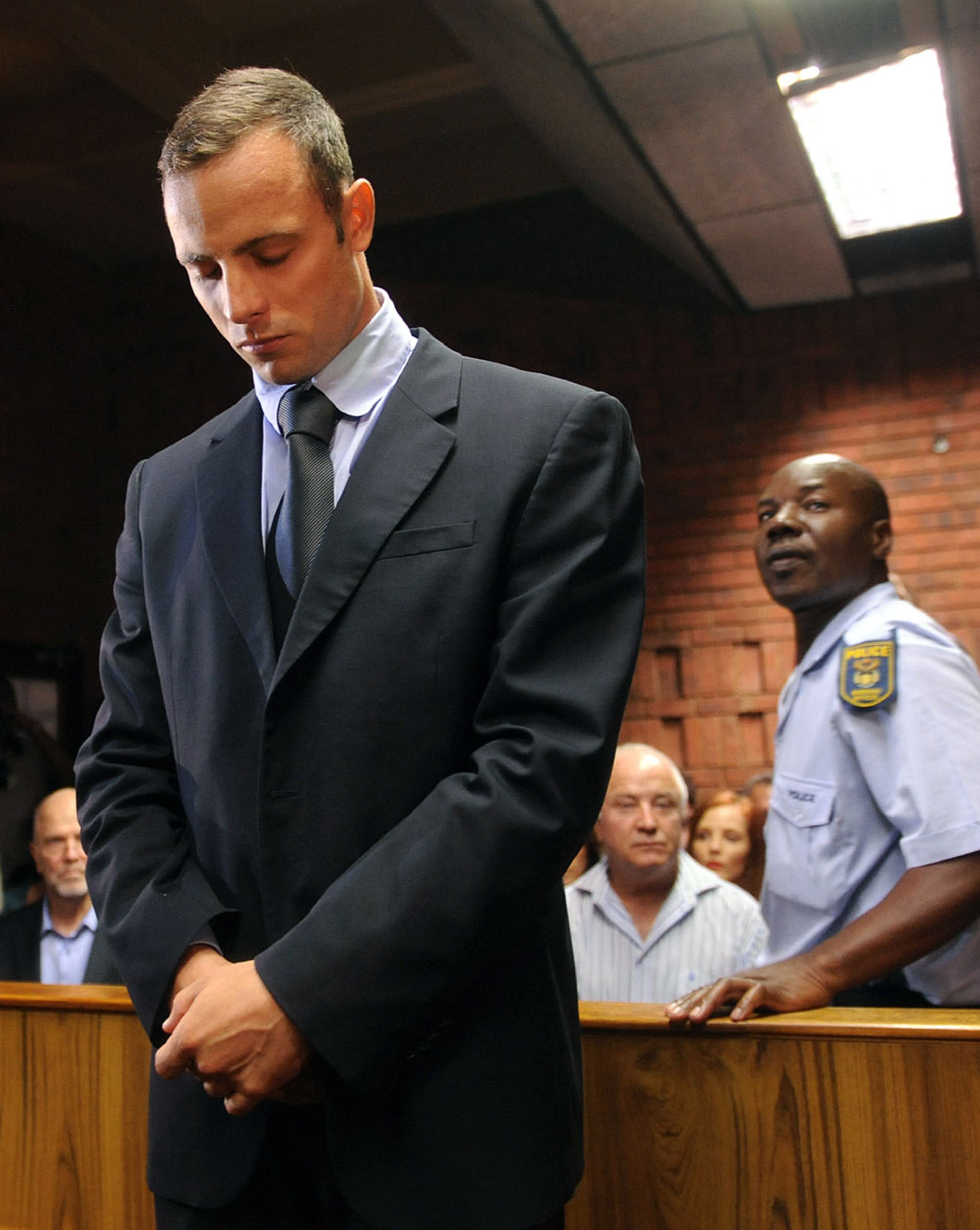 Olympic athlete, Oscar Pistorius , in court Friday Feb. 22, 2013 in Pretoria, South Africa, for his bail hearing charged with the shooting death of his girlfriend, Reeva Steenkamp. The defense and prosecution both completed their arguments with the magistrate soon to rule if the double-amputee athlete can be freed before trial or if he must stay behind bars pending trial. (AP Photo)