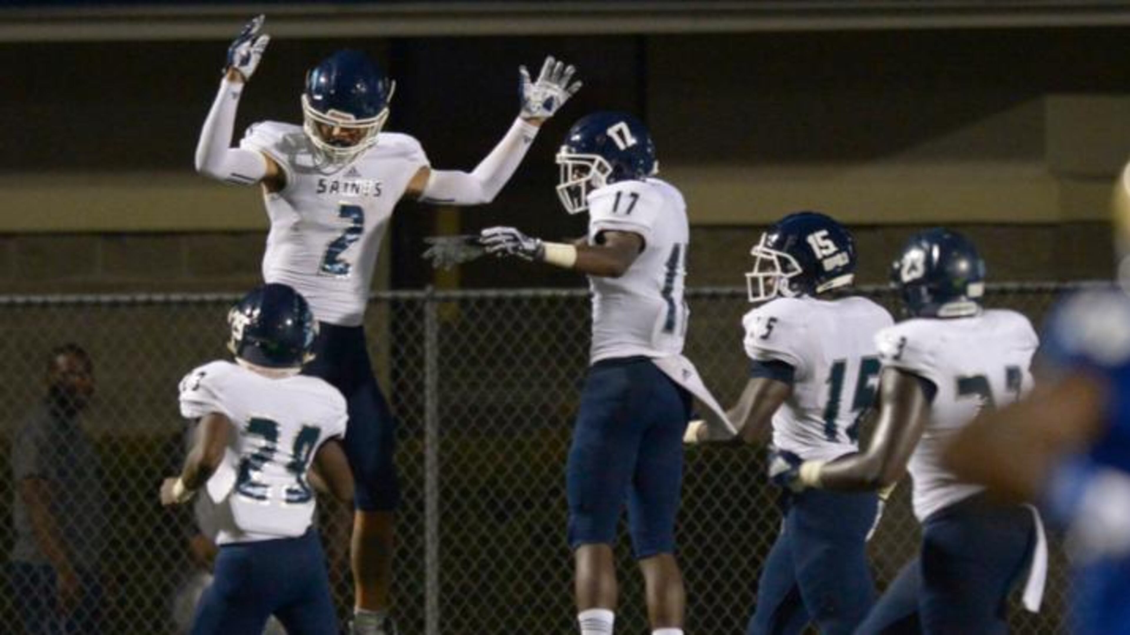 Senior WR Jadon Haselwood (2) celebrates his touchdown with the Saints in the second half of his game Friday, September 7, 2018 at McEachern High School . PHOTO/Daniel Varnado