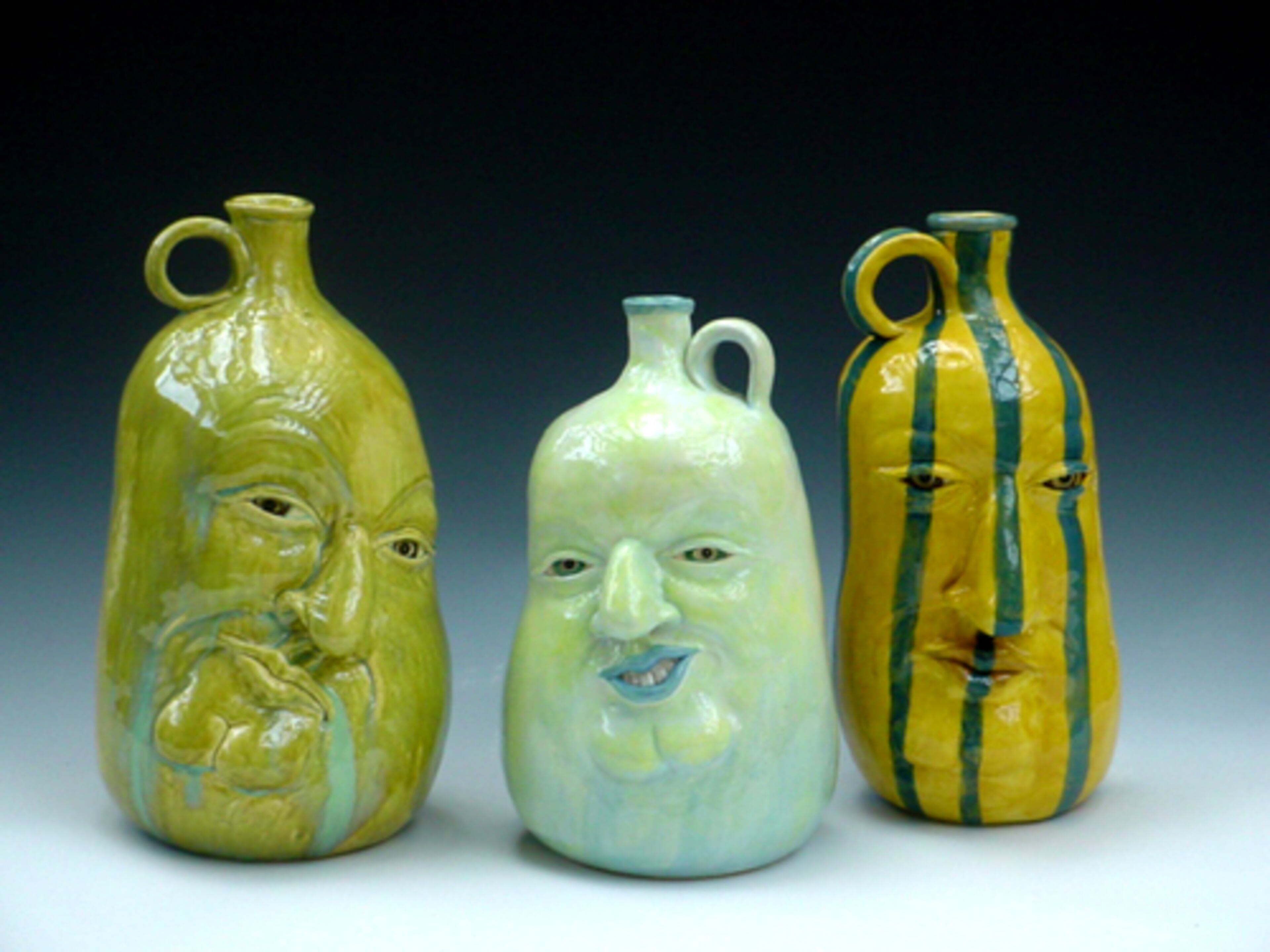 Three more face jugs by Griggs.