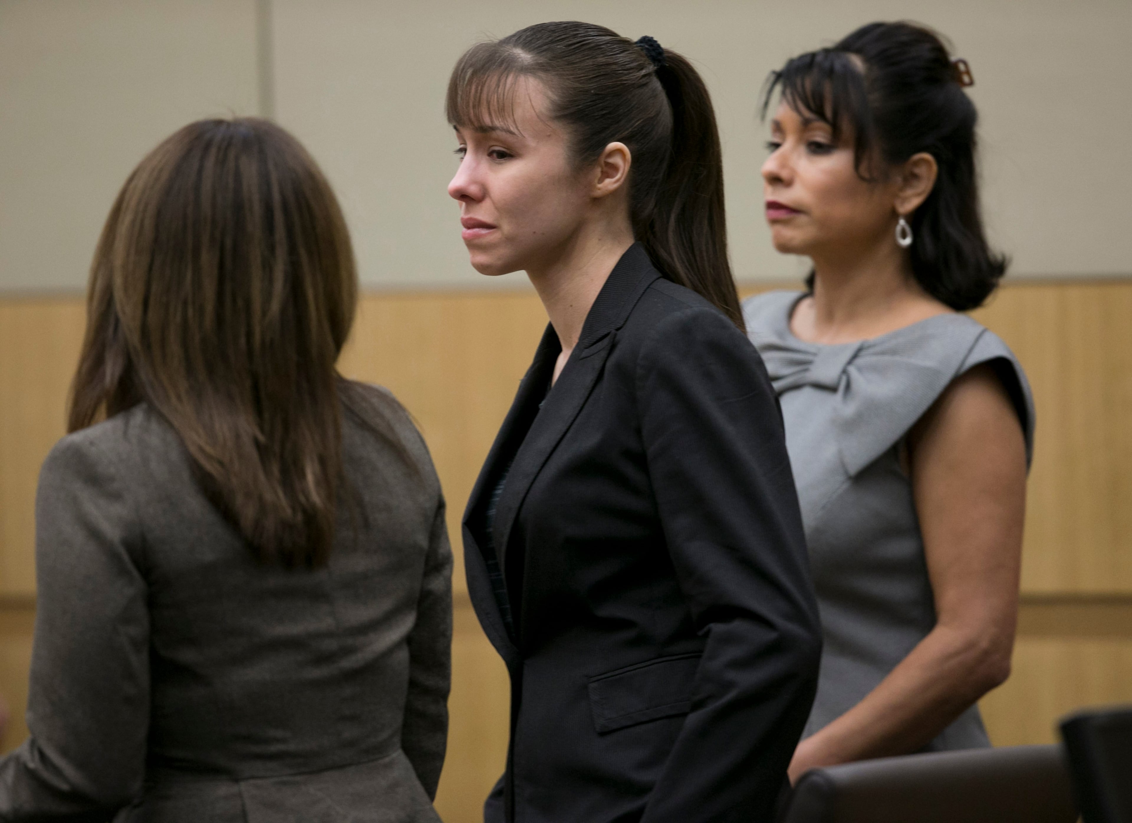 Jodi Arias stands as the jury is excused after the verdict for sentencing was declared a hung jury for her first degree murder conviction at Maricopa County Superior Court in Phoenix, Ariz., on Thursday, May 23, 2013. (AP Photo/The Arizona Republic, David Wallace, Pool)