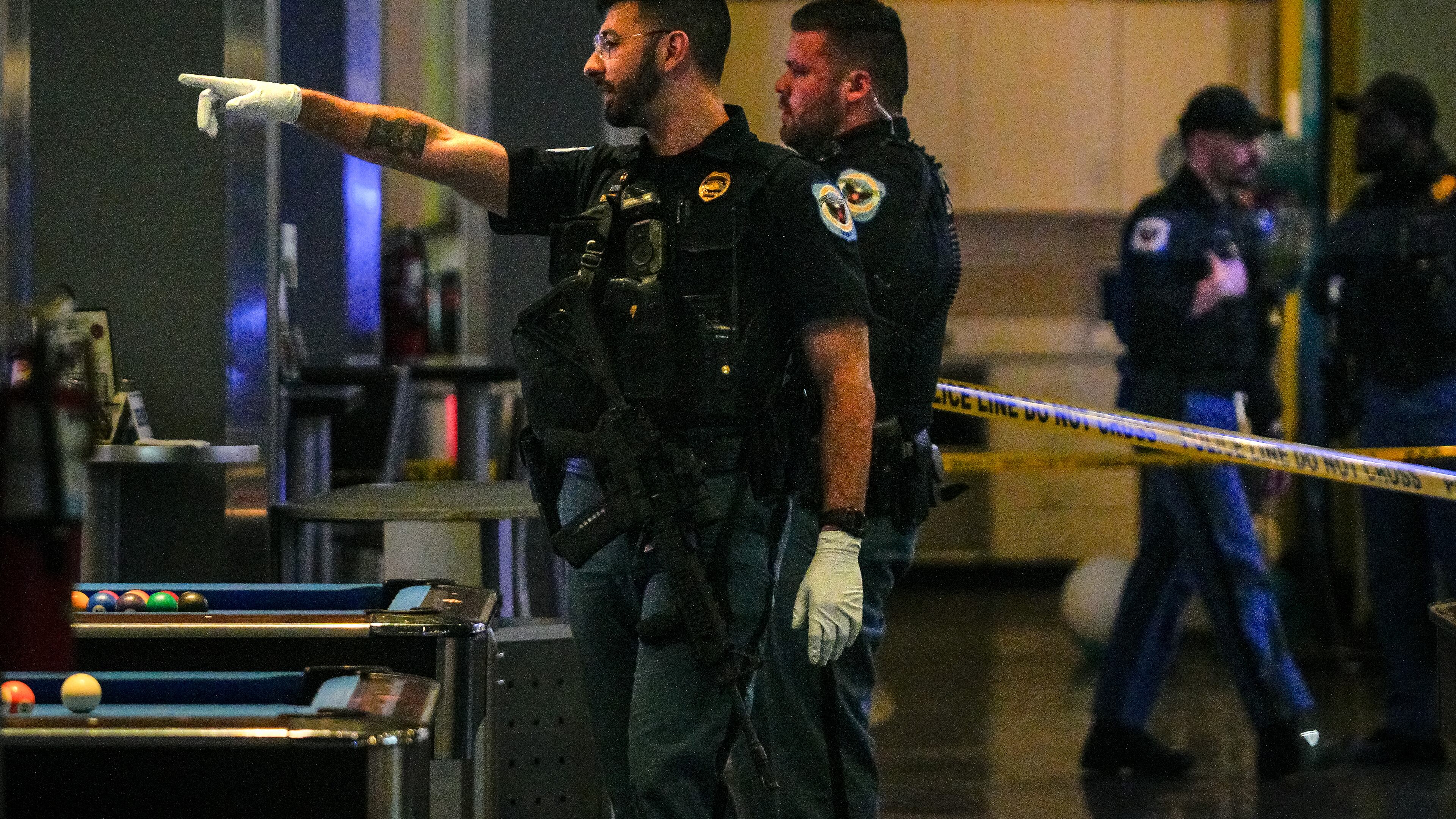 Cobb County officers were investigating a shooting at Main Event late Sunday. Two people were shot and the alleged shooter remains on the run, according to police.