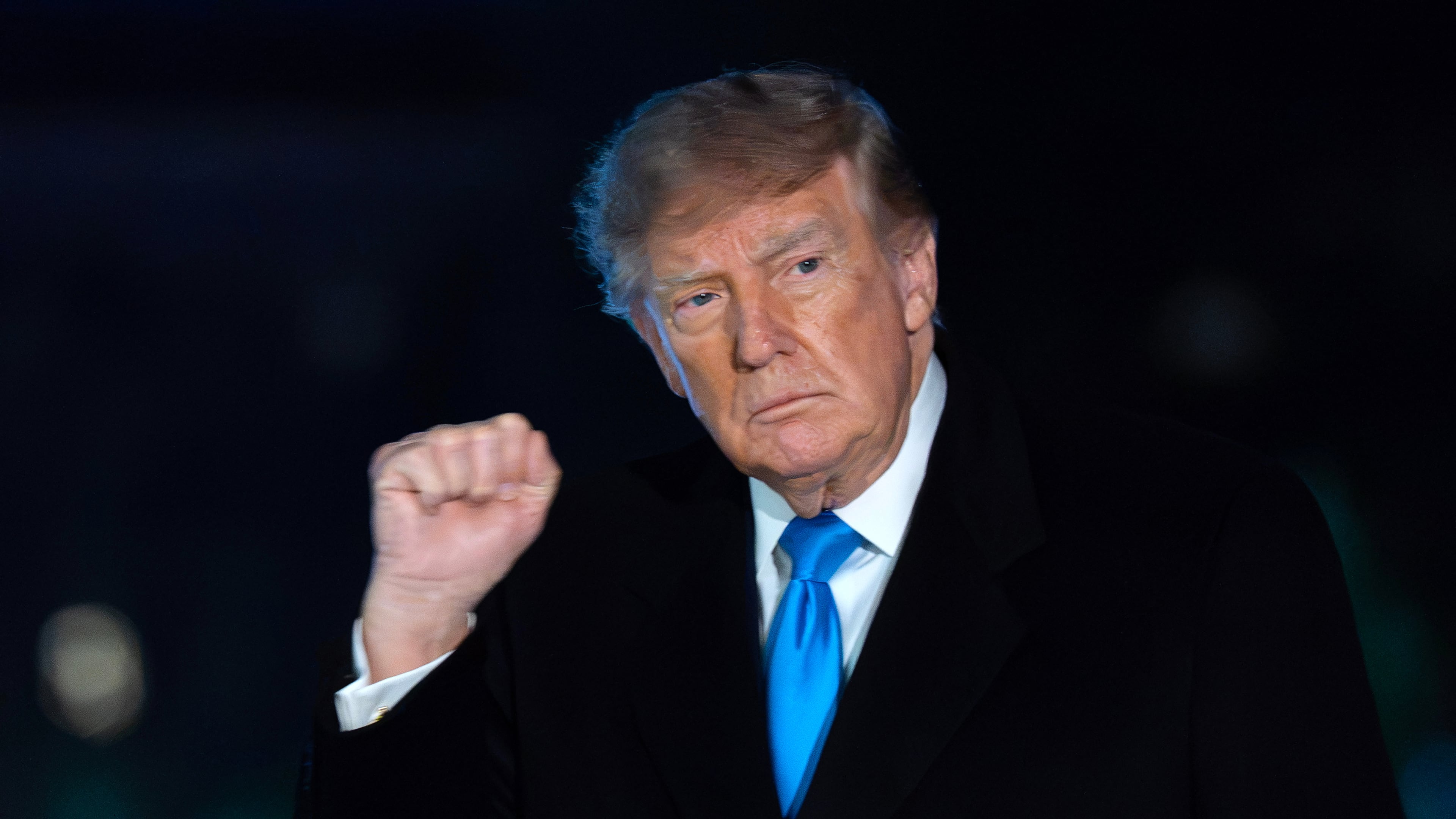 President Donald Trump gestures to reporters as he walks on the South Lawn upon his arrival at the White House, Monday, Oct. 5, 2026, in Washington. (AP Photo/Jose Luis Magana)