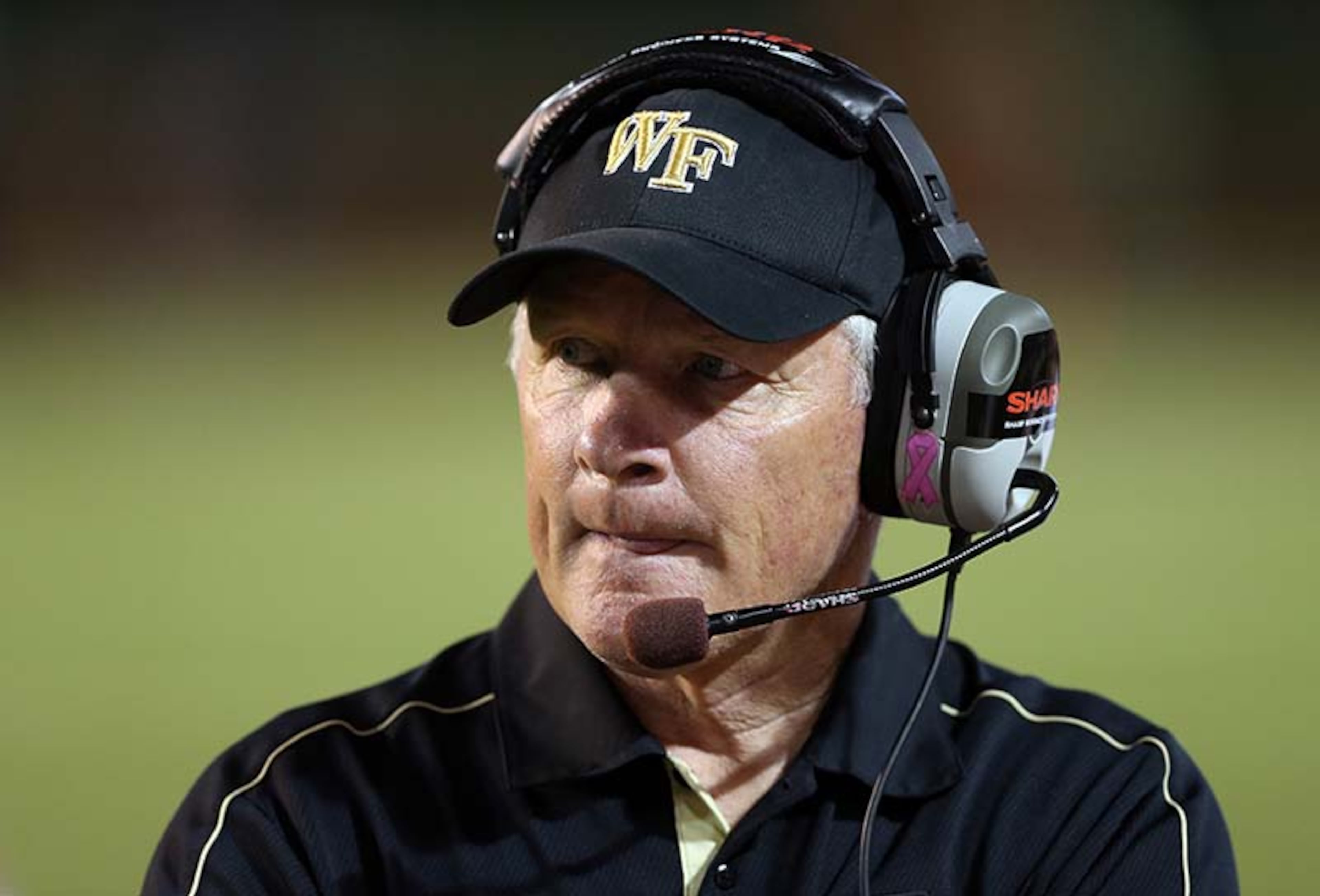 Jim Grobe resigned as Wake Forest coach in December, ending his 13-year tenure as the Demon Deacons' head football coach. Grobe's record at Wake Forest was 77-82, and is tied with Peahead Walker atop the school's win list. Grobe was replaced by Bowling Green's Dave Clawson.