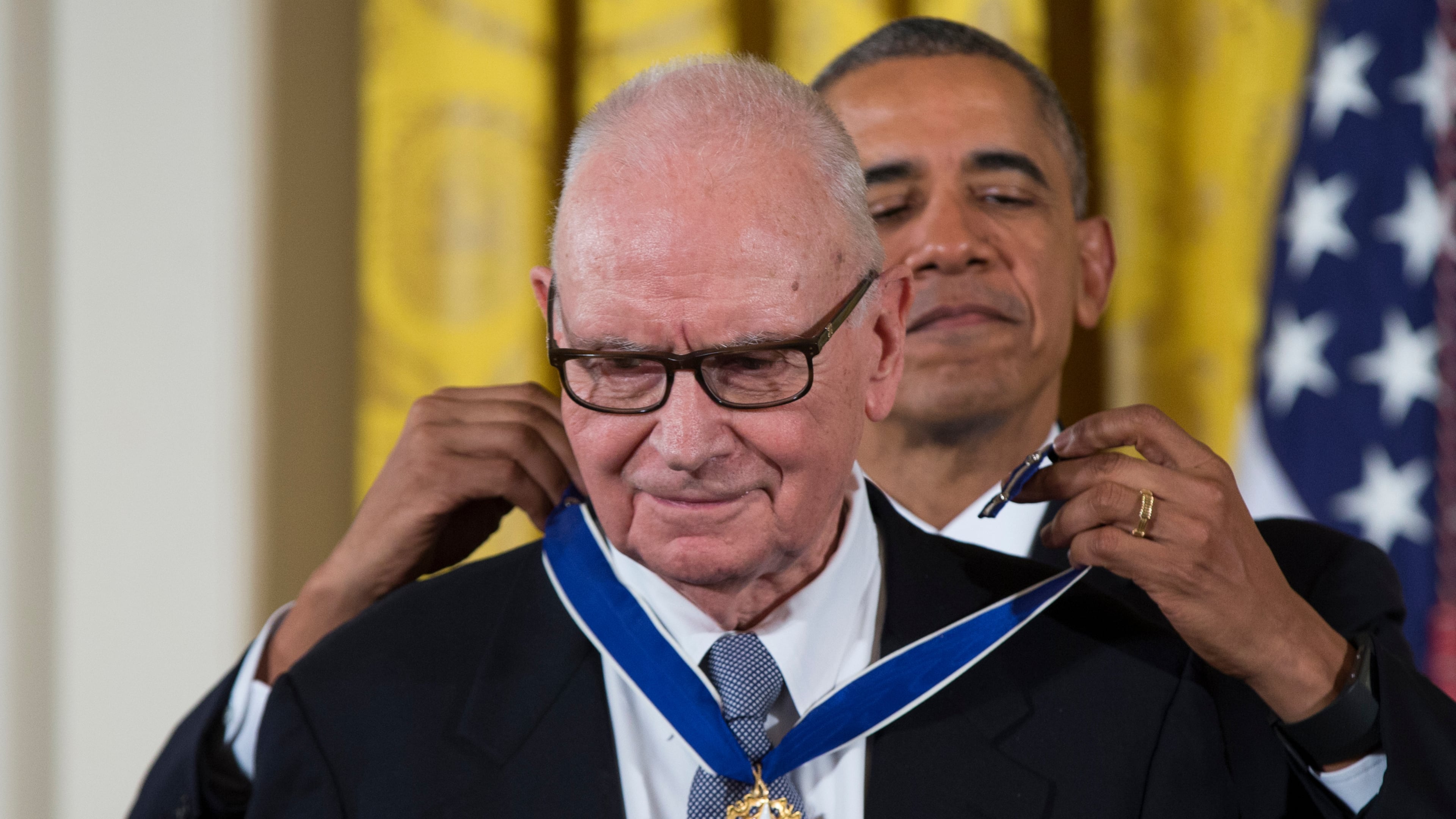 FILE - President Barack Obama, right, presents the Presidential Medal of Freedom to former Rep. Lee Hamilton, D-Ind., during a ceremony in the East Room of the White House, Nov. 24, 2015, in Washington. (AP Photo/Evan Vucci, File)