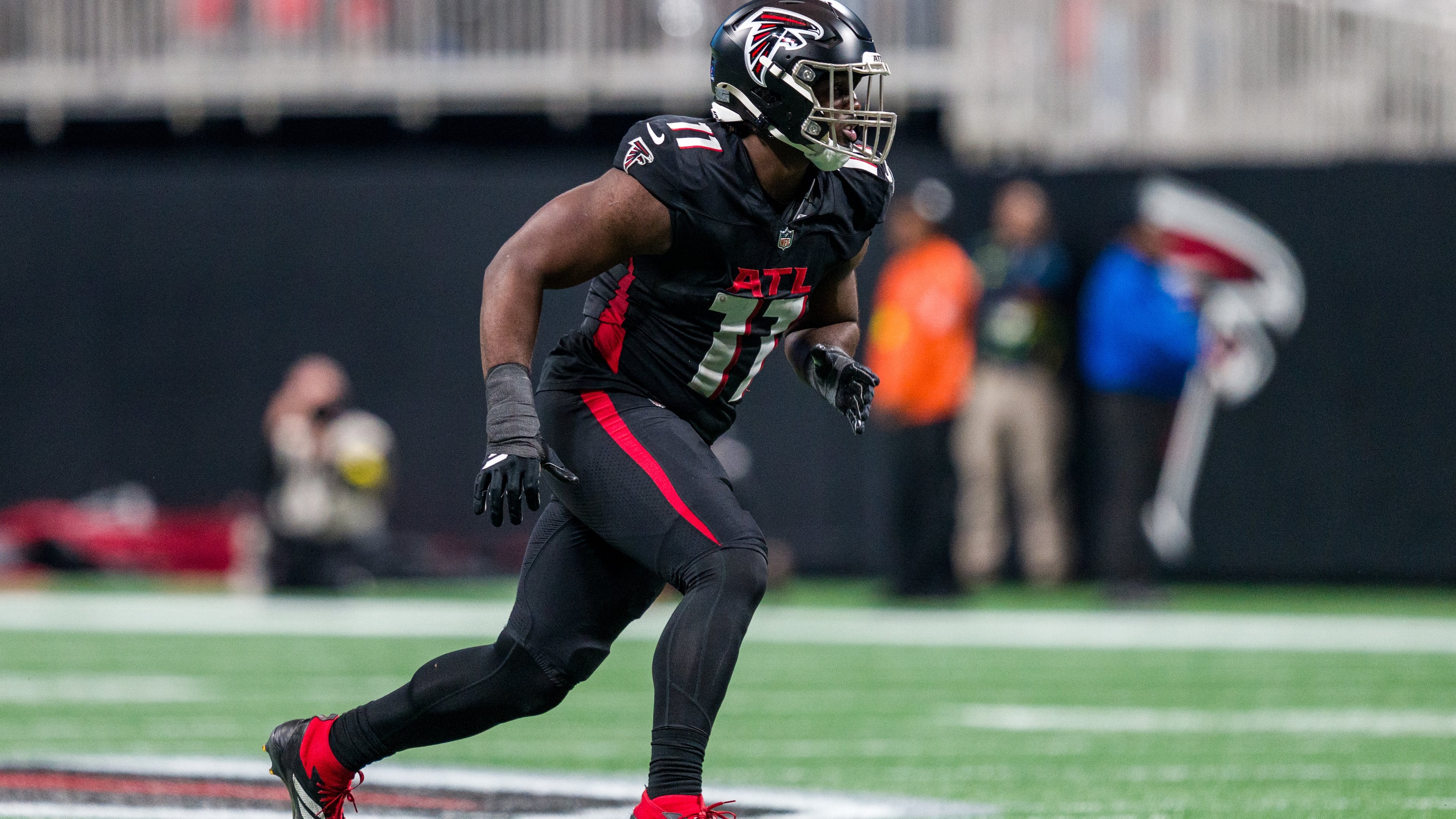 File- Atlanta Falcons linebacker Jalon Walker (11) works during the first half of an NFL football game against the New Orleans Saints, Sunday, Jan. 4, 2026, in Atlanta. (AP Photo/Danny Karnik,File)