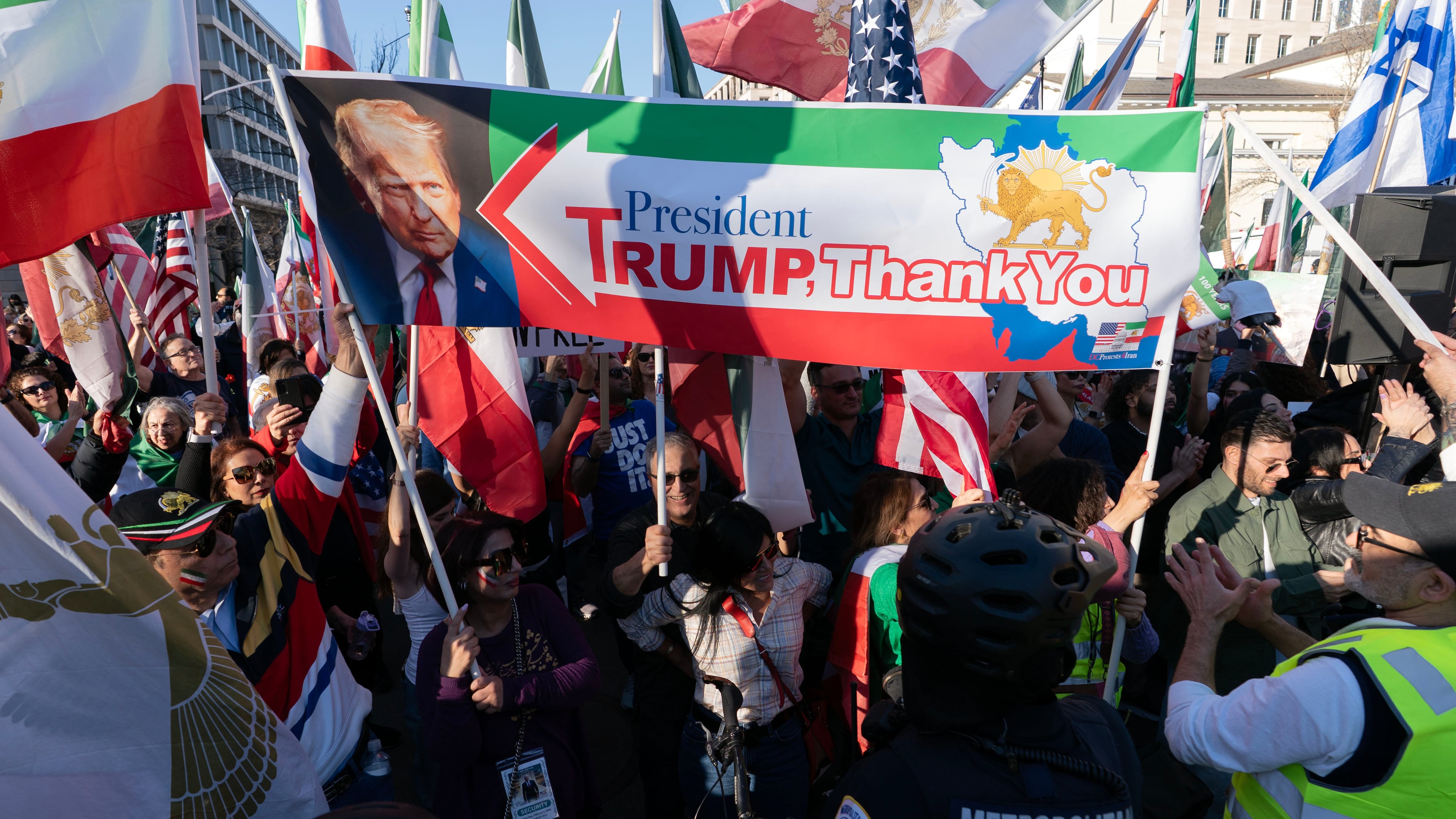 Supporters of the U.S. and Israeli strikes on Iran rallied near the White House in Washington on Saturday. (Jose Luis Magana/AP)