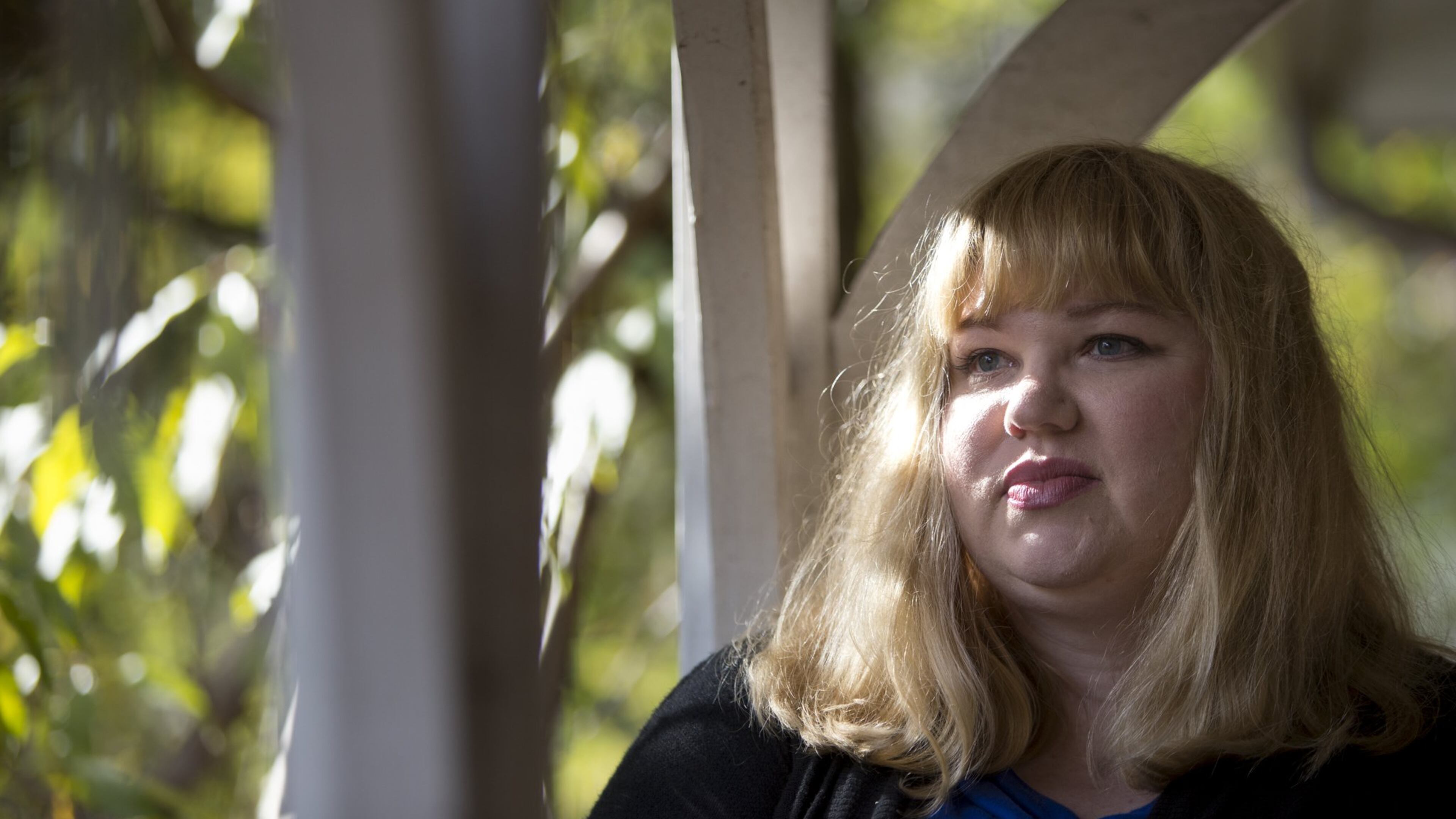 11-20-17 - Decatur, GA - Lisa Anderson, 40, of Atlanta, Georgia, poses for a portrait outside of her home in Decatur, Georgia, on Monday, Nov. 20, 2017. When Lisa Anderson underwent a successful operation to remove a brain tumor after she had been told she was going to die for two years, she finally felt she had her life back. Then, she was raped. She left University of California, Irvine, where she was working toward a Ph.D, saying, “I couldn’t be on campus with my rapist.” A lawsuit, a car wreck, and law degree later, Anderson started Atlanta Women for Equality in 2012. A year later, the organization became an official 501(c)(3) non-profit. This year, Atlanta Women for Equality filed its first big case, and is still being funded entirely by private donations. After her rape, Anderson said that she used to be averse to lawsuits, lawyers and the like, but learned that sometimes “the only way to make people change and follow the law is to kick them in the coffers.” Since 2006 when she enrolled in law school at the University of Minnesota to 2013 when she passed the Georgia Bar Exam, Anderson never forgot what happened to her at UC Irvine, and she never wavered from her goal: “I wanna sue the crap out of people who do this.” (CASEY SYKES, CASEY.SYKES@AJC.COM)