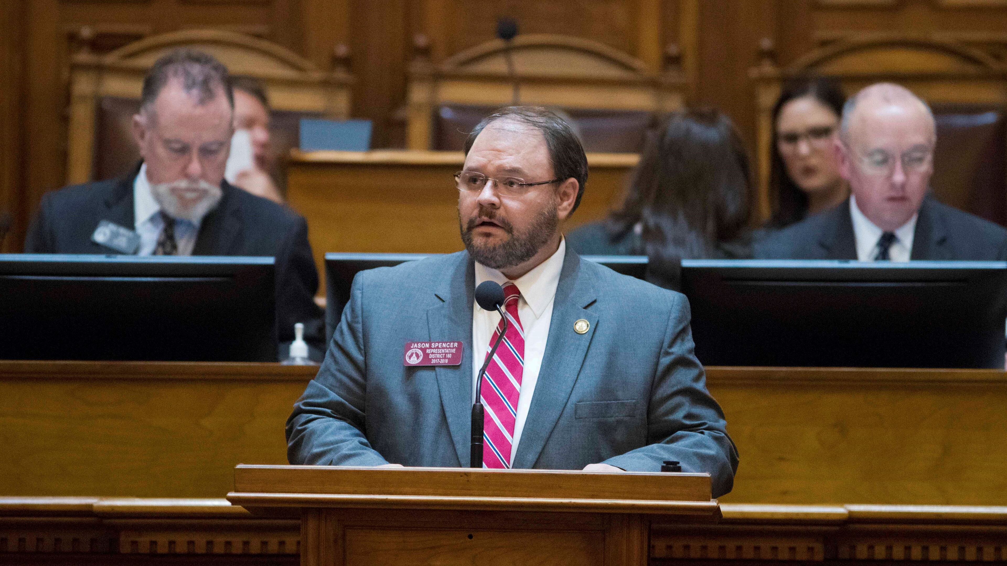 Caption: 02/28/2018 -- Atlanta, GA - Rep. Jason Spencer, R - Woodbine, sponsors HB 605, the Hidden Predator Act, at the House Chambers during Crossover day at the Georgia State Capitol in Atlanta, Wednesday, February 28, 2018. ALYSSA POINTER/ALYSSA.POINTER@AJC.COM