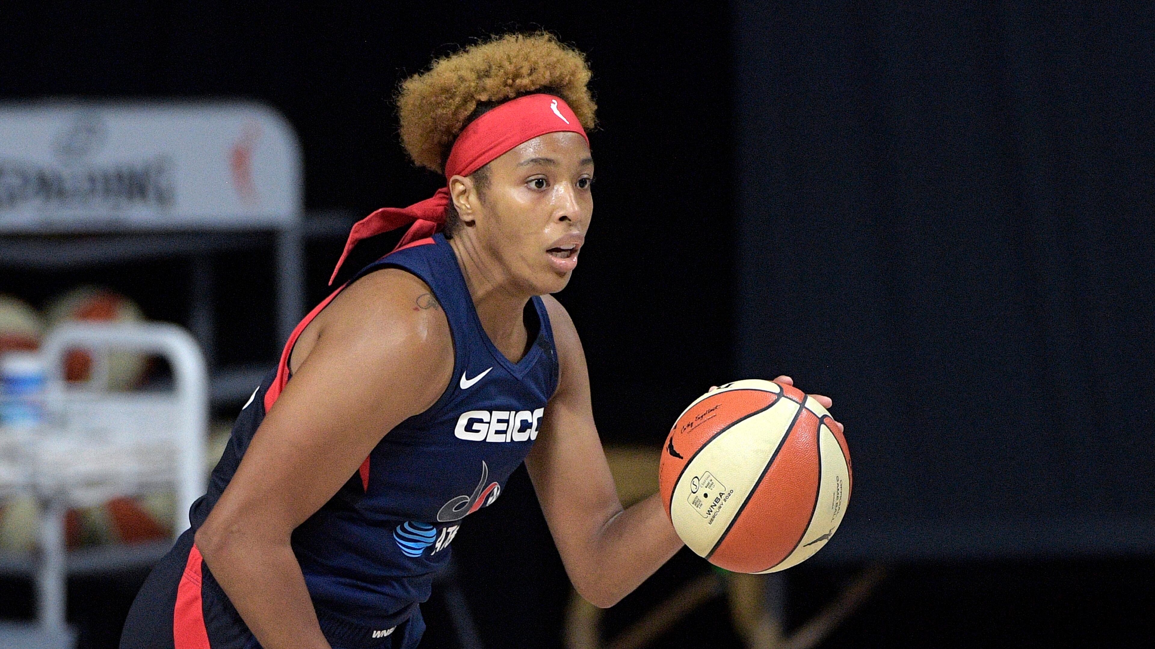 Washington Mystics forward Tianna Hawkins (21) brings the ball up the court during the first half of a WNBA basketball first round playoff game against the Phoenix Mercury, Tuesday, Sept. 15, 2020, in Bradenton, Fla. (AP Photo/Phelan M. Ebenhack)