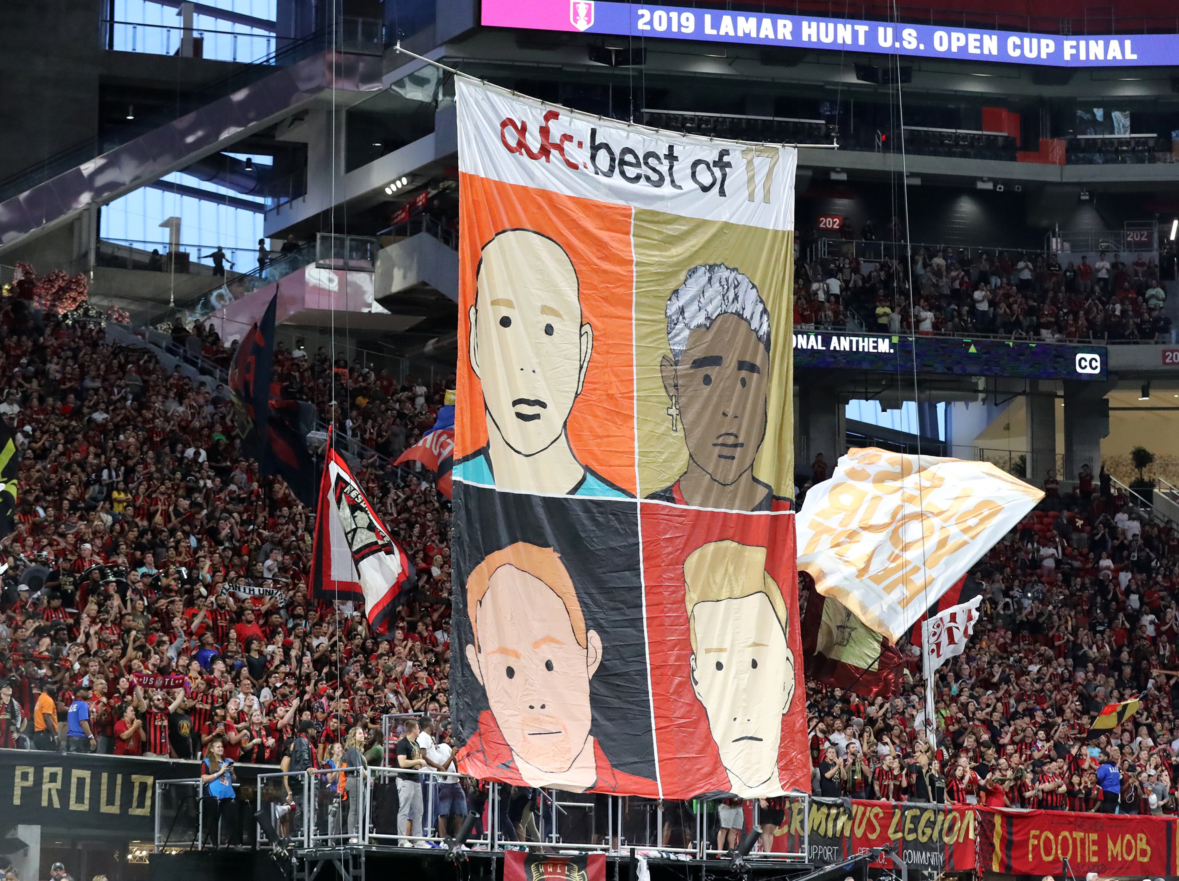 Atlanta United fans raise a tiffo for their team against Minnesota United in the final for the U.S. Open Cup on Tuesday, August 27, 2019, in Atlanta. Curtis Compton/ccompton@ajc.com