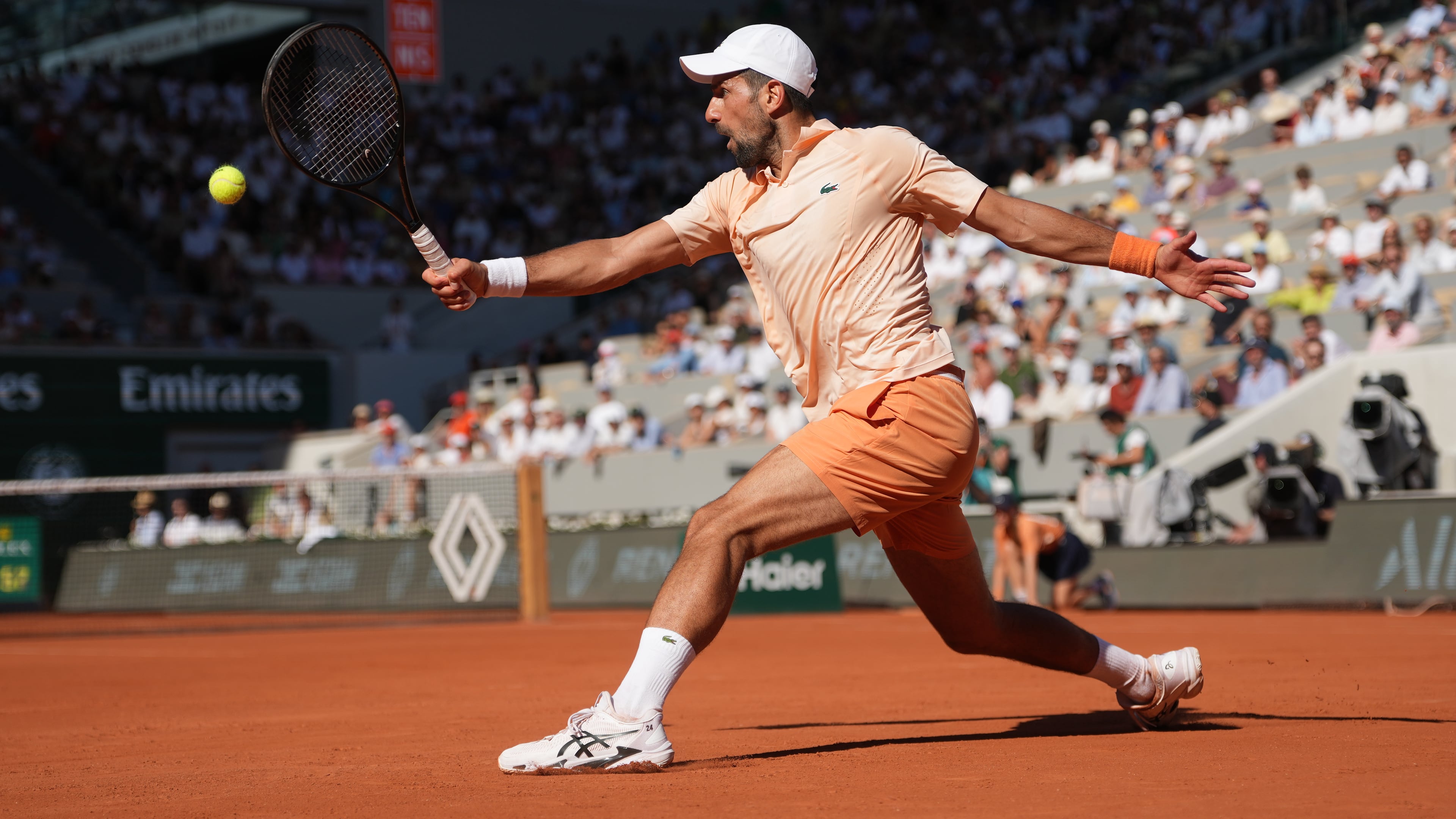 Novak Djokovic of Serbia returns to Valentin Royer of France during their second round men's singles tennis match at the French Open tennis tournament in Paris, Wednesday, May 27, 2026. (AP Photo/Thibault Camus)