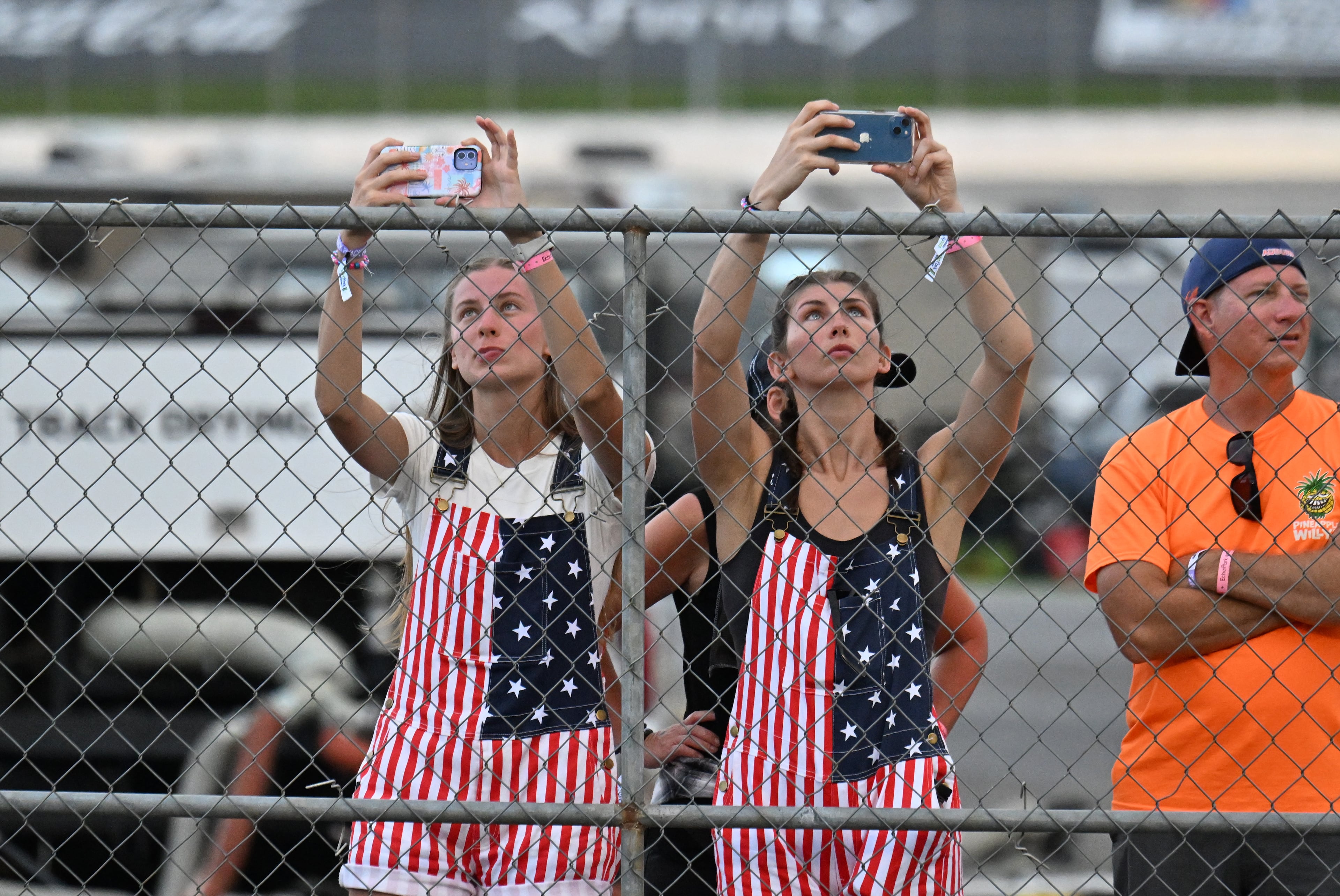 NASCAR fans watch the start of Quaker State 400 NASCAR Cup Series race at EchoPark Speedway, Saturday, June 28, 2025, in Hampton. (Hyosub Shin / AJC)