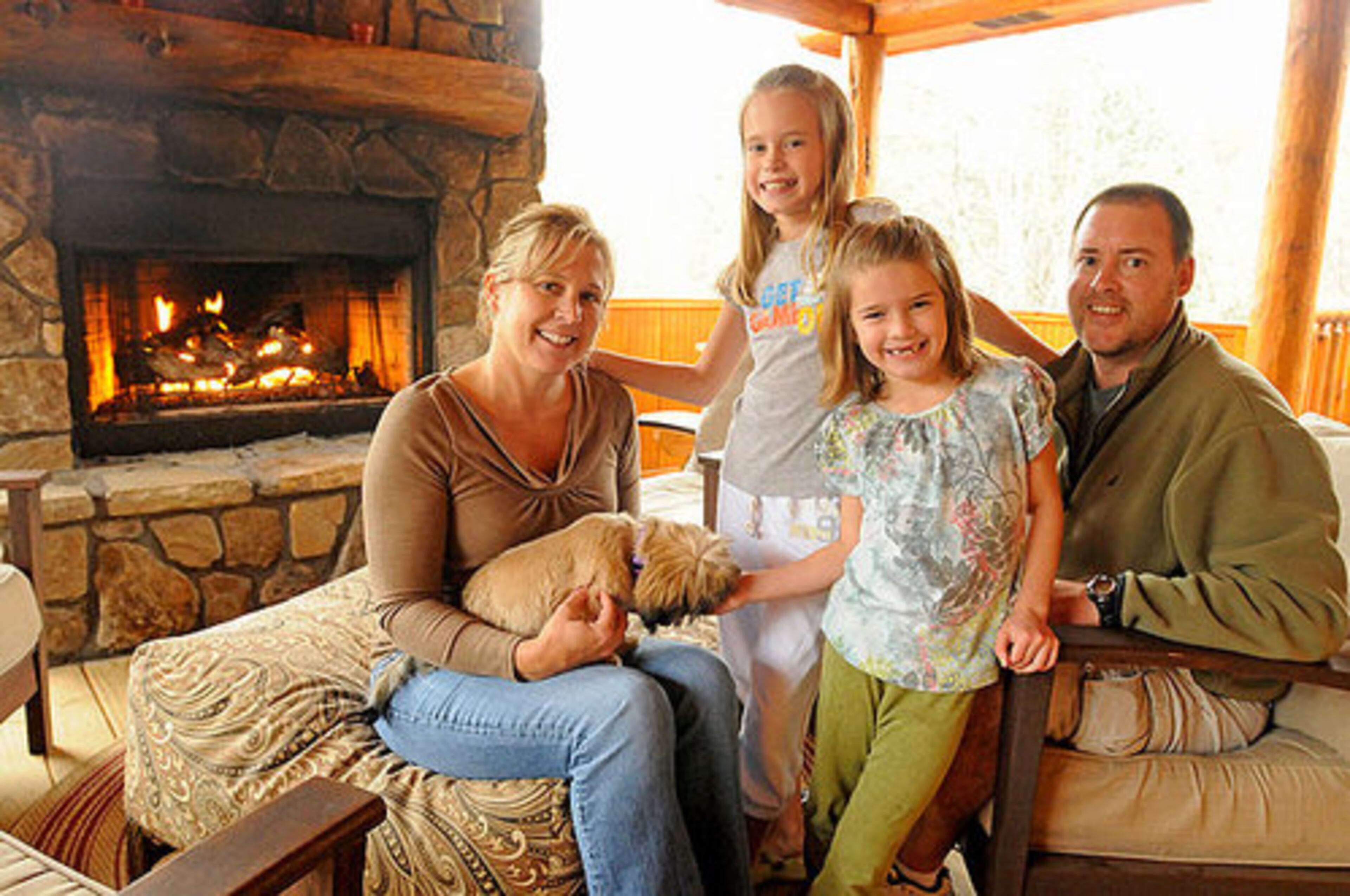 Brent and April Saunders' log cabin in Blue Ridge has 2 bedrooms, 2 baths and about 1,600 square feet, plus about 500 more square feet on the porch. The couple, who have two daughters, 9-year-old Audra and 6-year-old Olivia, purchased it two years ago. "The best thing about it is just to get away from everything and just not have your normal day-to-day stuff that's facing you," April said. "You can just enjoy the serenity of nature."