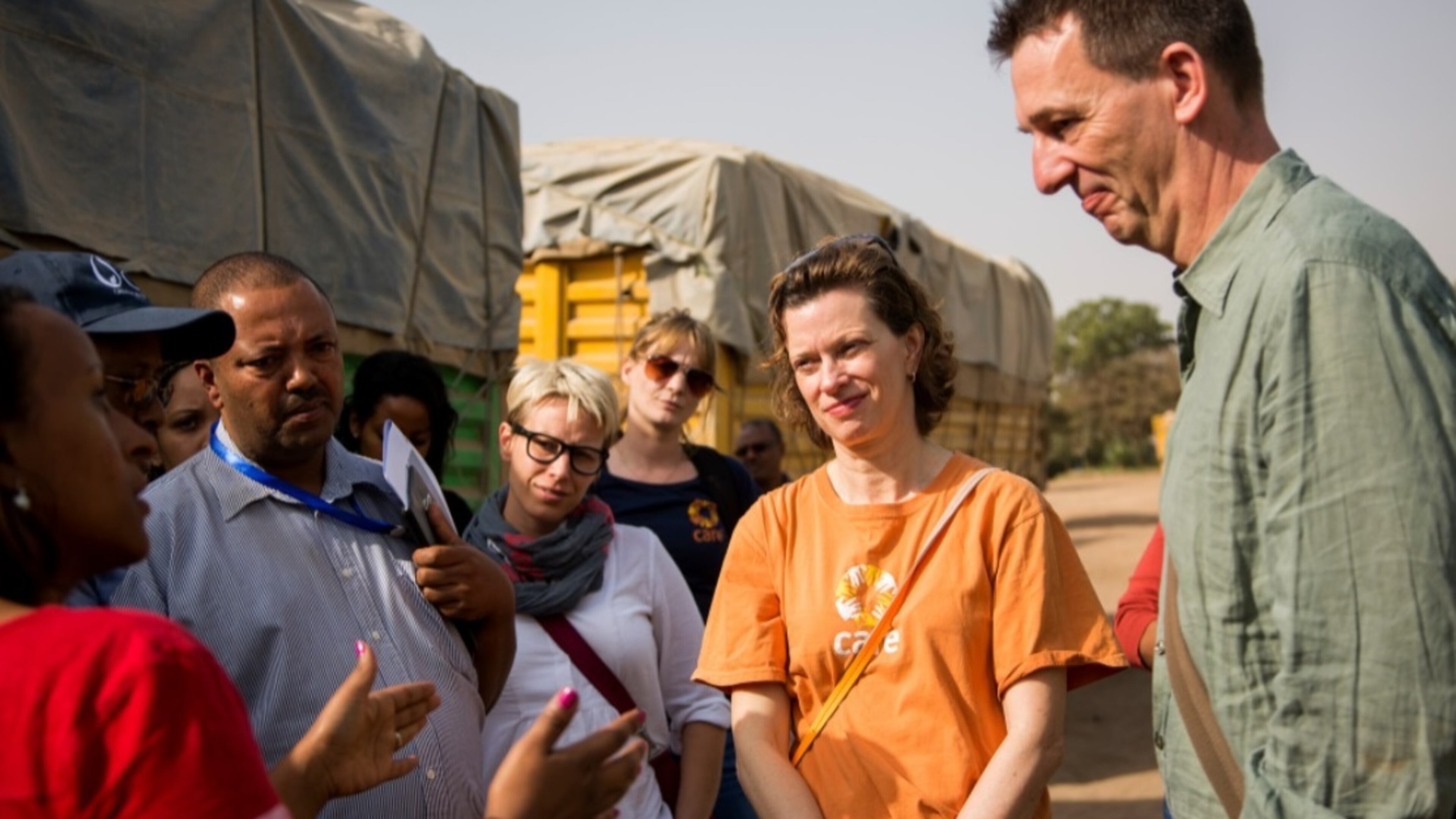 Headquartered in Atlanta, CARE USA has laid off hundreds of employees across the nation and thousands abroad in the wake of the Trump administration’s massive cuts to federal foreign aid. The nonprofit has also temporarily slashed wages for its employees, including President and CEO Michelle Nunn, second from right. (Terhas Berhe/CARE)
