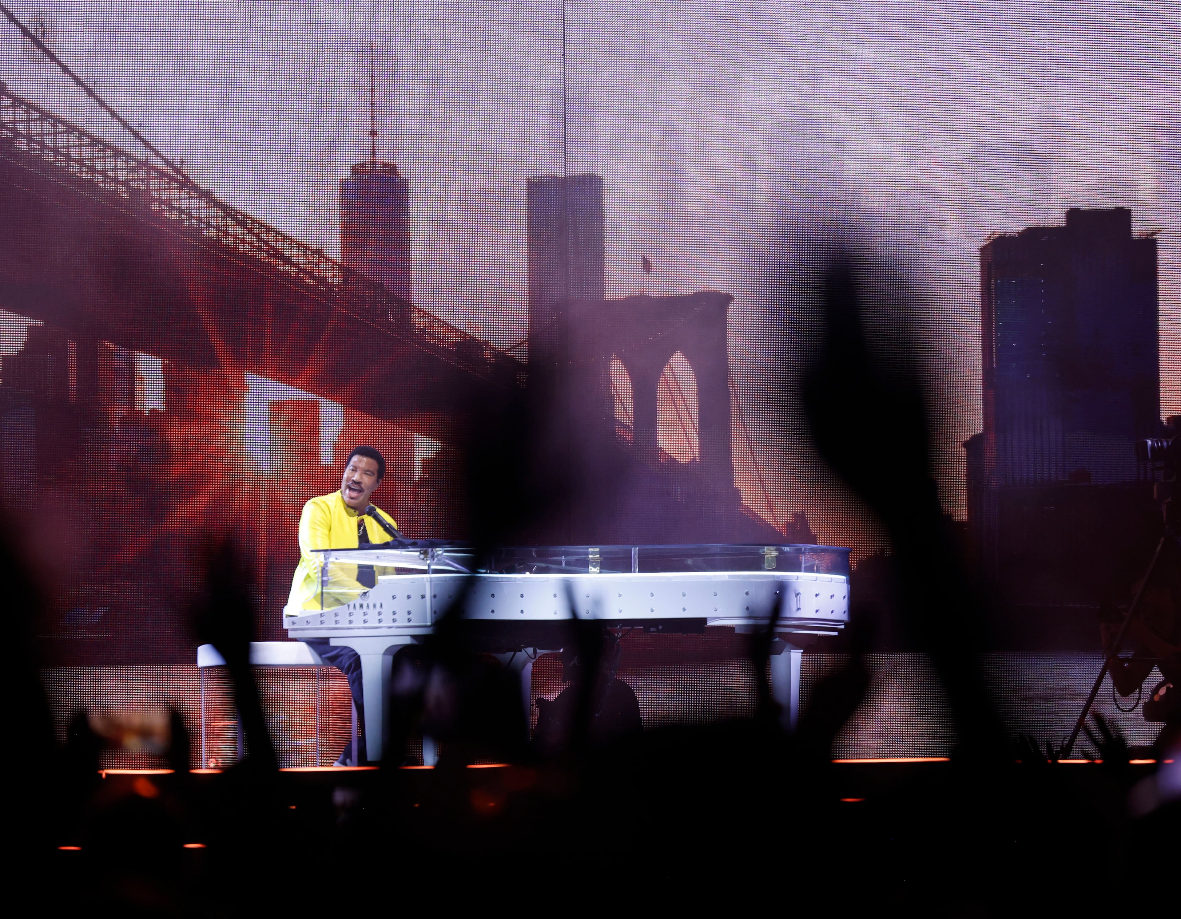 Lionel Richie takes to his piano for some of his iconic hits, performed at State Farm Arena on Sunday, July 19, 2026. (Akili-Casundria Ramsess for the AJC)