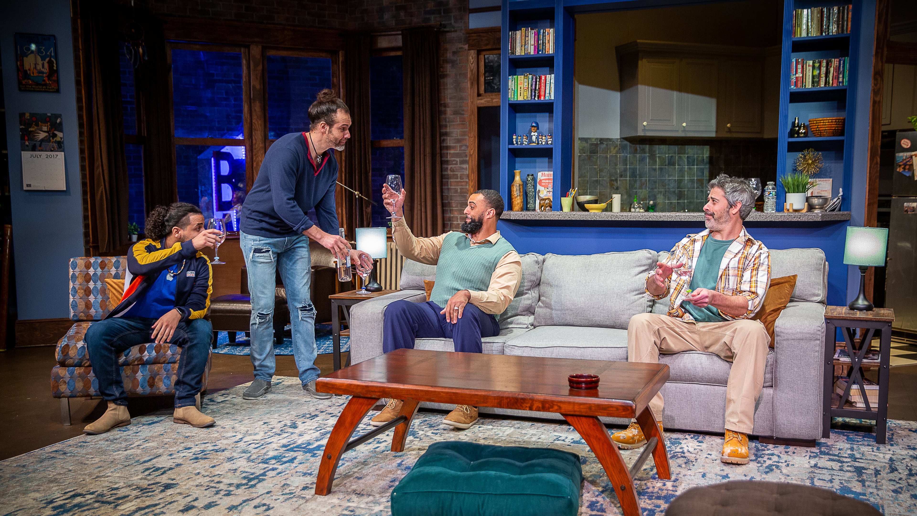 Kevin (Sariel Toribio, from left), Brian (Louis Kyper), Delano (Marcus Hopkins-Turner) and Roger (Evan Bergman) share pink wine and their feelings in Horizon Theatre’s “Support Group for Men.”