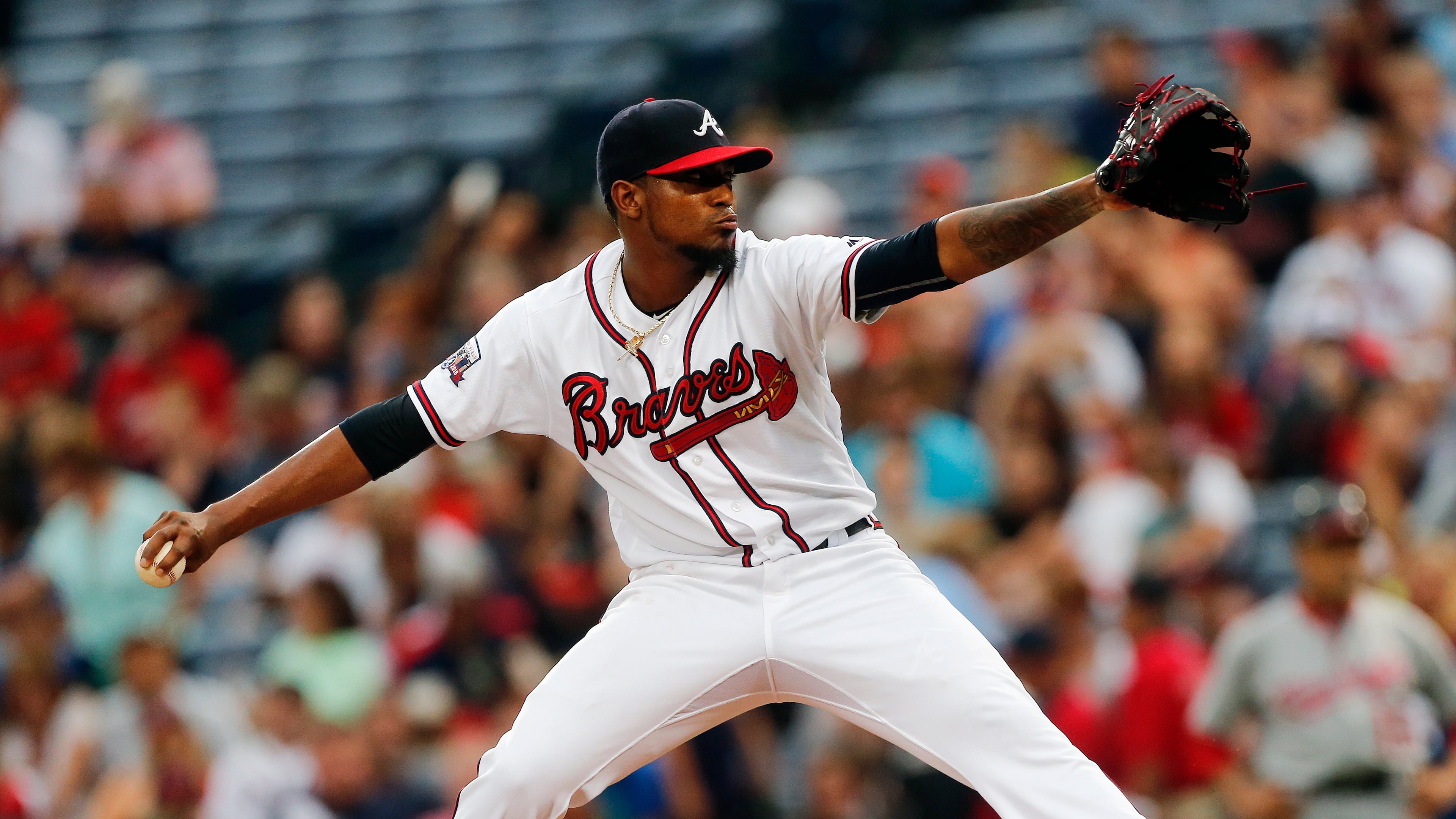 Braves starting pitcher Julio Teheran works against the Washington Nationals in the first inning of a baseball game Friday, Aug. 19, 2016, in Atlanta. (AP Photo/John Bazemore)