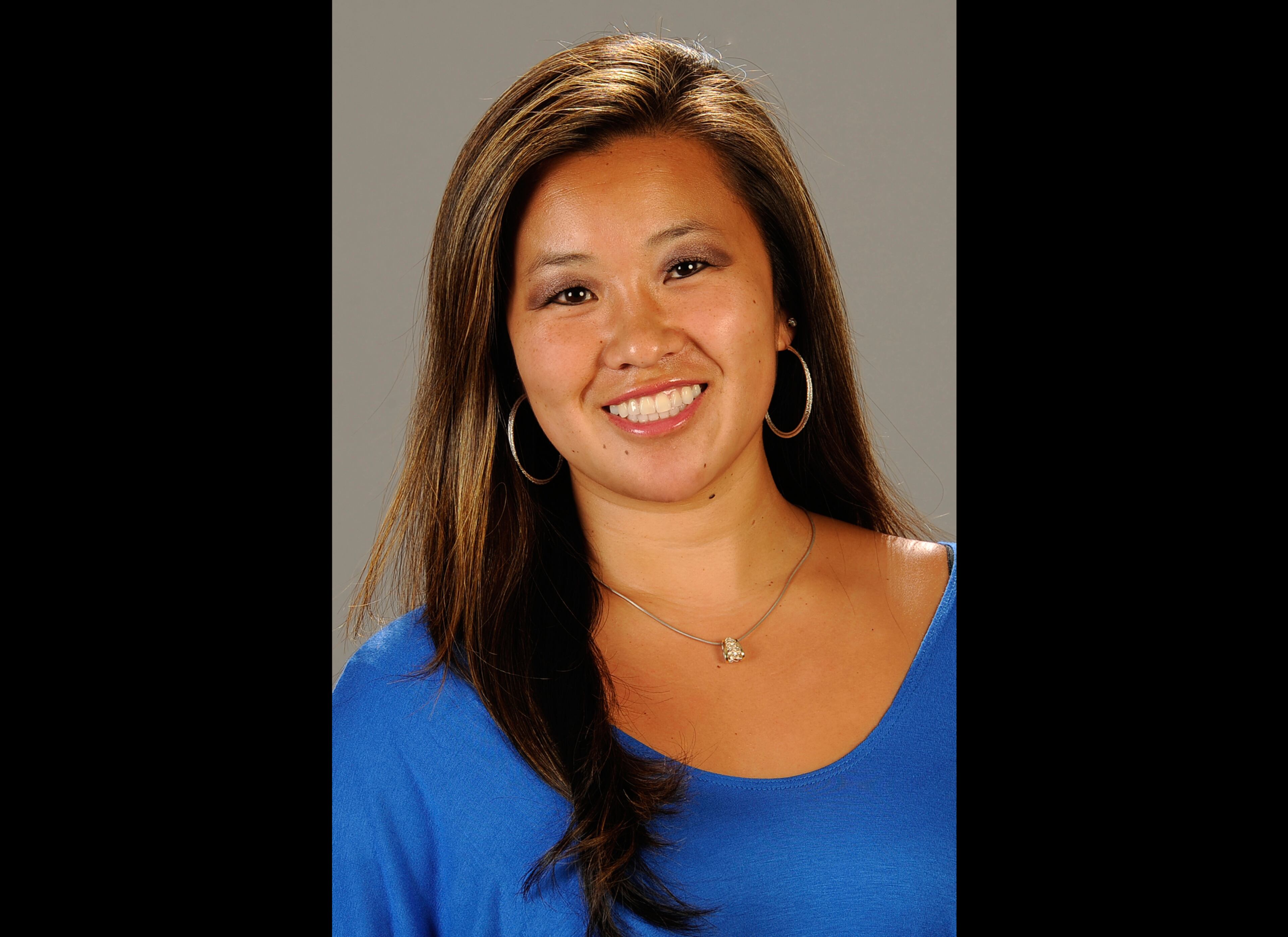 This undated file photo provided by Cal State Fullerton on Monday, Feb. 4, 2013, shows Cal State Fullerton assistant women's NCAA college basketball coach Monica Quan in Fullerton, Calif. Quan and her fiance Keith Lawrence were found shot to death Sunday night on the top floor of a parking structure at the complex, police said. Former LAPD officer and U.S. Navy reservist Christopher Jordan Dorner, 33, is a suspect in the killings.