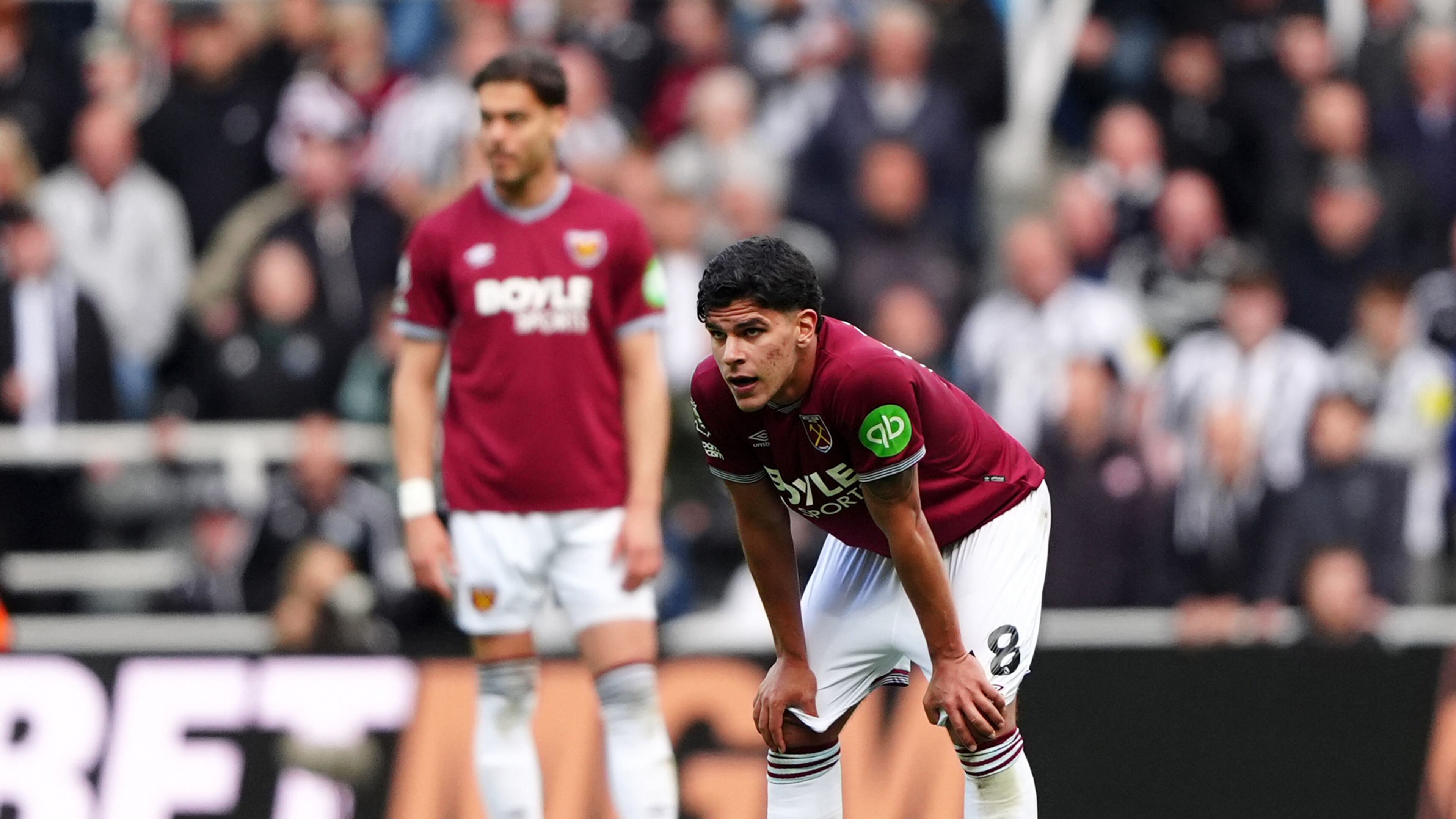 West Ham United's Mateus Fernandes reacts after conceding their side's third goal of the game during their English Premier League soccer match against Newcastle United in Newcastle upon Tyne, England, Sunday, May 17, 2026. (Owen Humphreys/PA via AP)