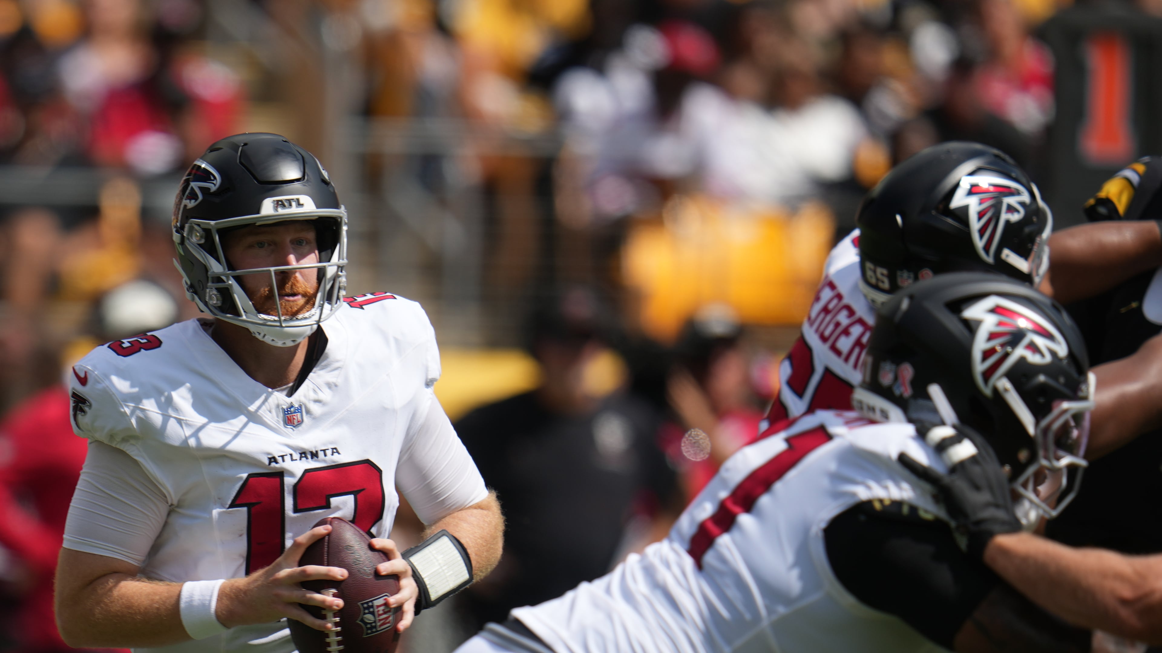 Atlanta Falcons quarterback Cooper Rush (13) looks to pass the ball during an NFL football game against the against the Pittsburgh Steelers, Sunday, Sept. 13, 2026, in Pittsburgh. (AP Photo/Gene J. Puskar)