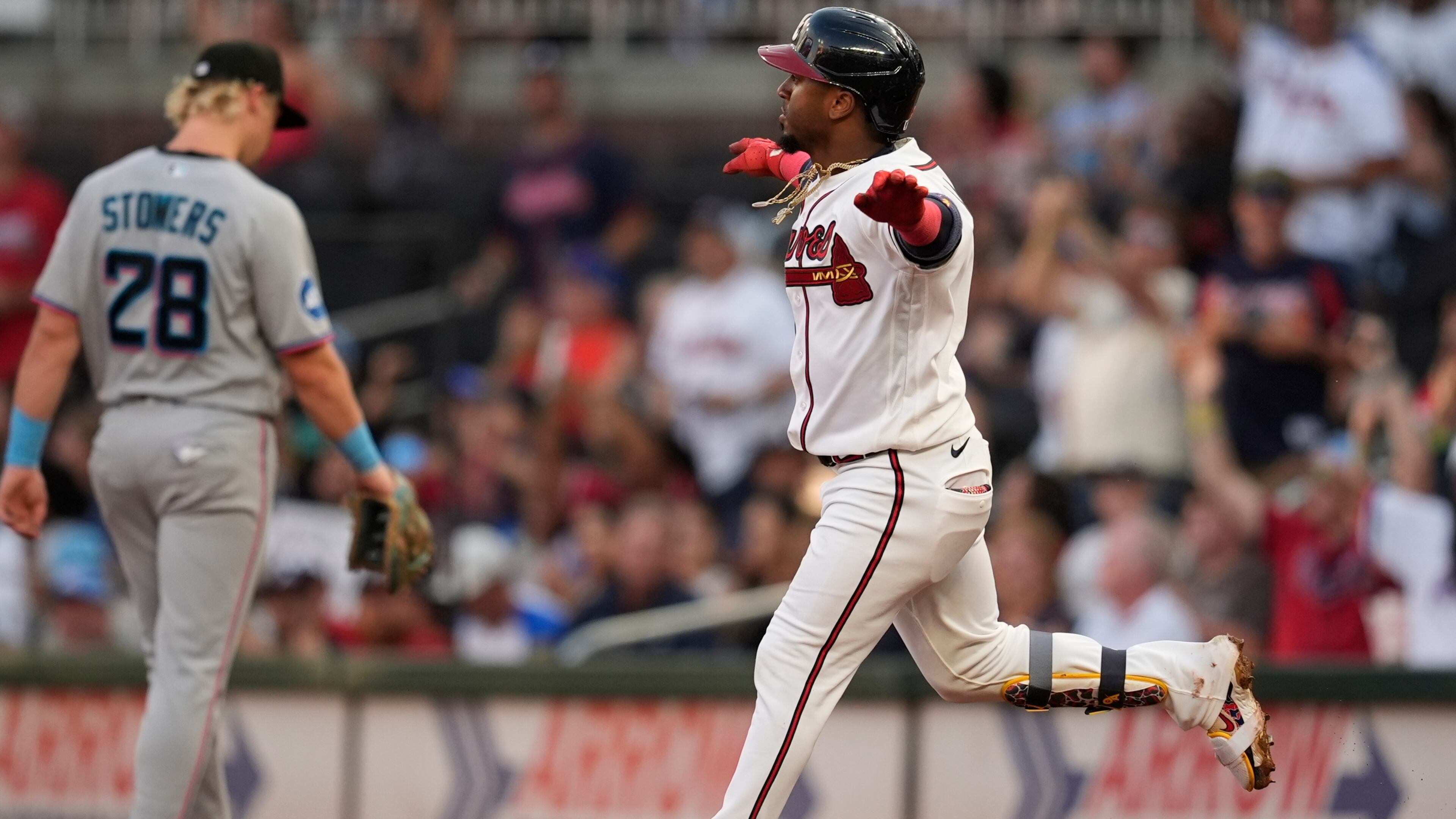 Atlanta Braves' Ozzie Albies (1) celebrates his solo homerun in the second inning of a baseball game against the Miami Marlins, Tuesday, Aug. 4, 2026, in Atlanta. (AP Photo/Mike Stewart)
