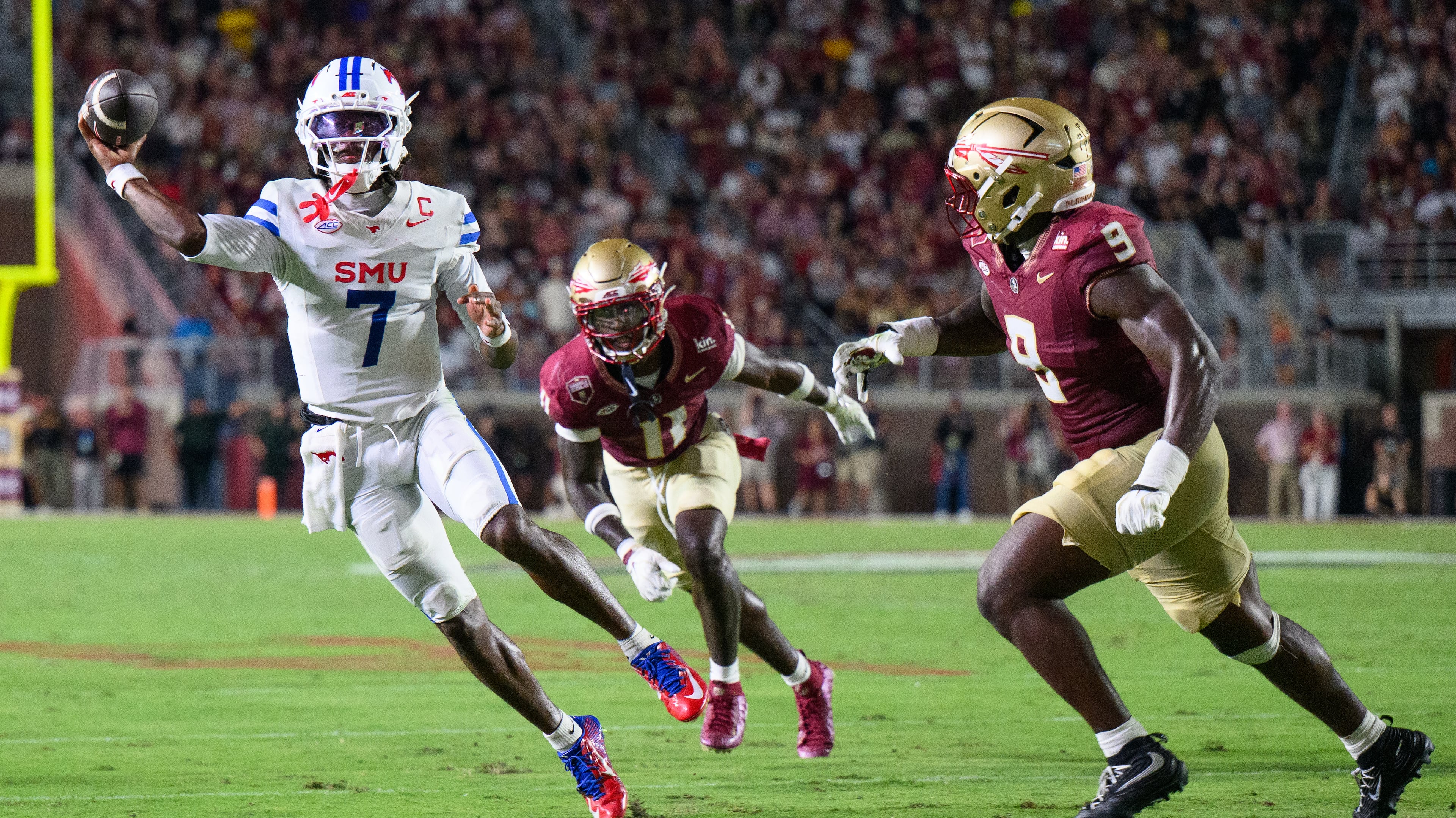 SMU quarterback Kevin Jennings (7) looks to throw during the first half of an NCAA college football game against Florida State, Monday, Sept. 7, 2026, in Tallahassee, Fla. (AP Photo/Noah Lantor)