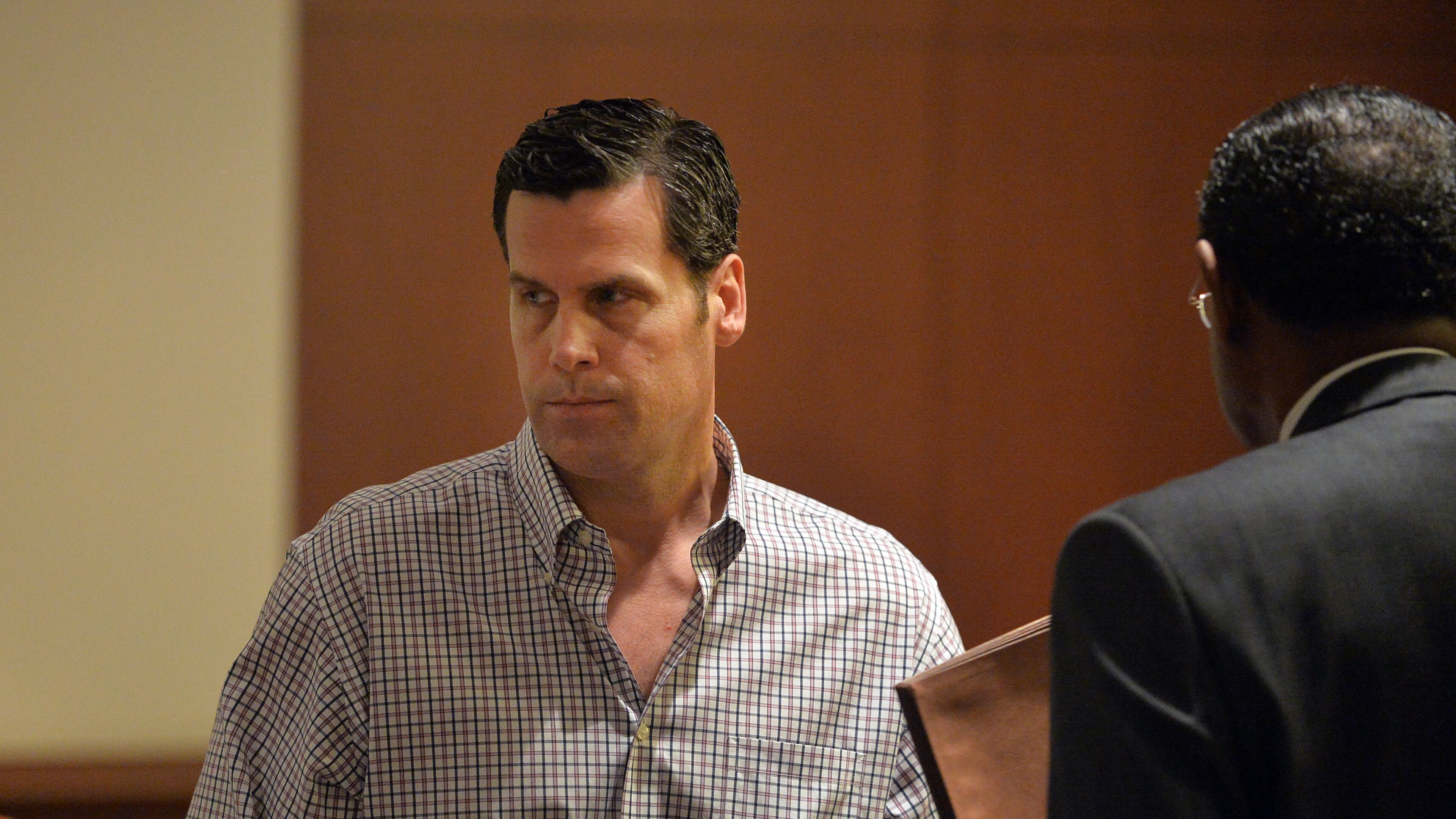 MAY 18, 2015 ATLANTA Rick Warren leaves court following the hearing. Warren, the Buckhead investor who has bought up some 10 percent of Atlanta’s English Avenue neighborhood, appears before Atlanta Municipal Court Judge Crystal Gaines, Monday, May 18, 2015. His trial was continued to May 27, over objections by the city solicitors office, due to a substitution issue with his new defense attorney, George Lawson. Warren now faces17 charges. As a habitual offender, a conviction would mean jail time. In this most recent case, code enforcement officers say he left a burnt-out house open, vacant and overgrown. He owns at least 100 properties through a half-dozen or more LLCs, many of them crumbling under his ownership. KENT D. JOHNSON /KDJOHNSON@AJC.COM