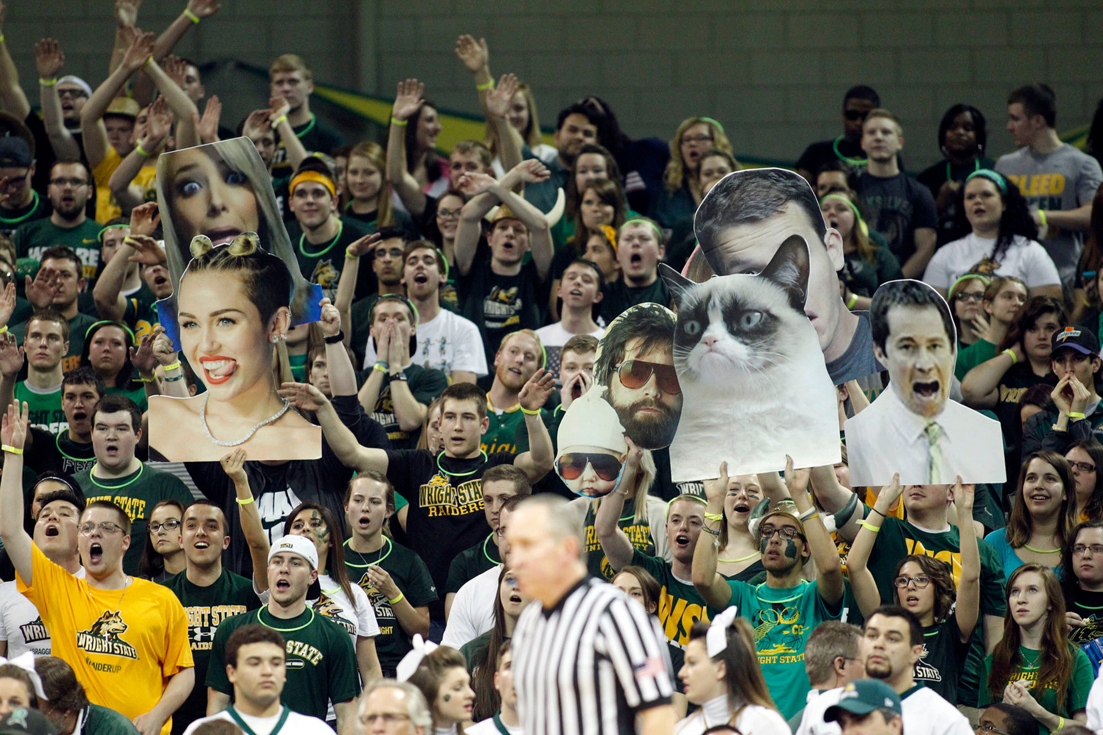 Wright State Fans had a variety of faces to help cheer on their team as the Raiders hosted the Panthers for the Horizon League Championship. TY GREENLEES / STAFF
