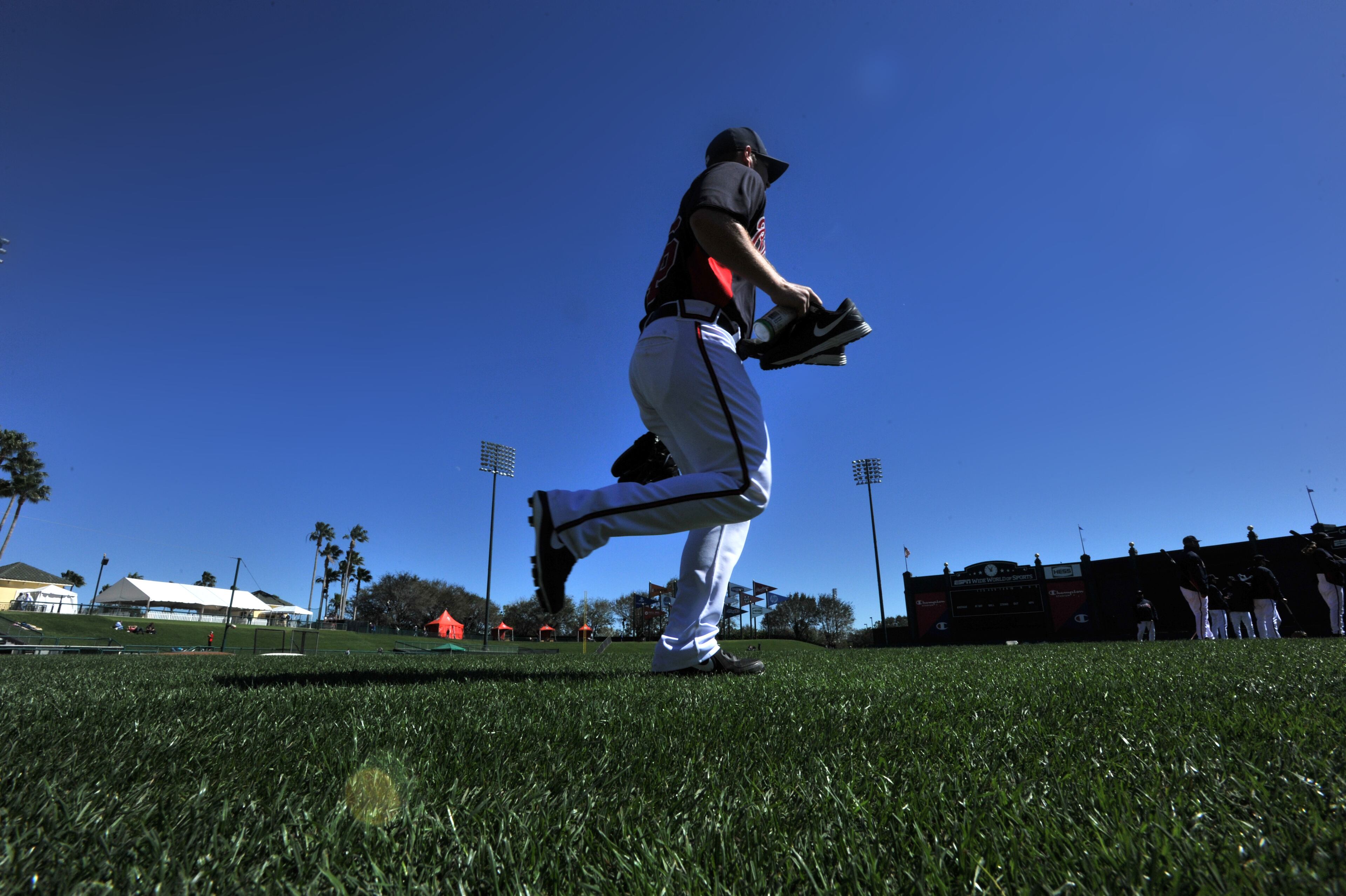 February 17, 2013 Lake Buena Vista, Fl: Atlanta Braves pitcher Craig Kimbrel walks onto the field to start the third full squad workout at Champion Stadium in the ESPN Wide World of Sports Complex in Lake Buena Vista, Fl., on Sunday, Feb. 17, 2013. HYOSUB SHIN / HSHIN@AJC.COM
