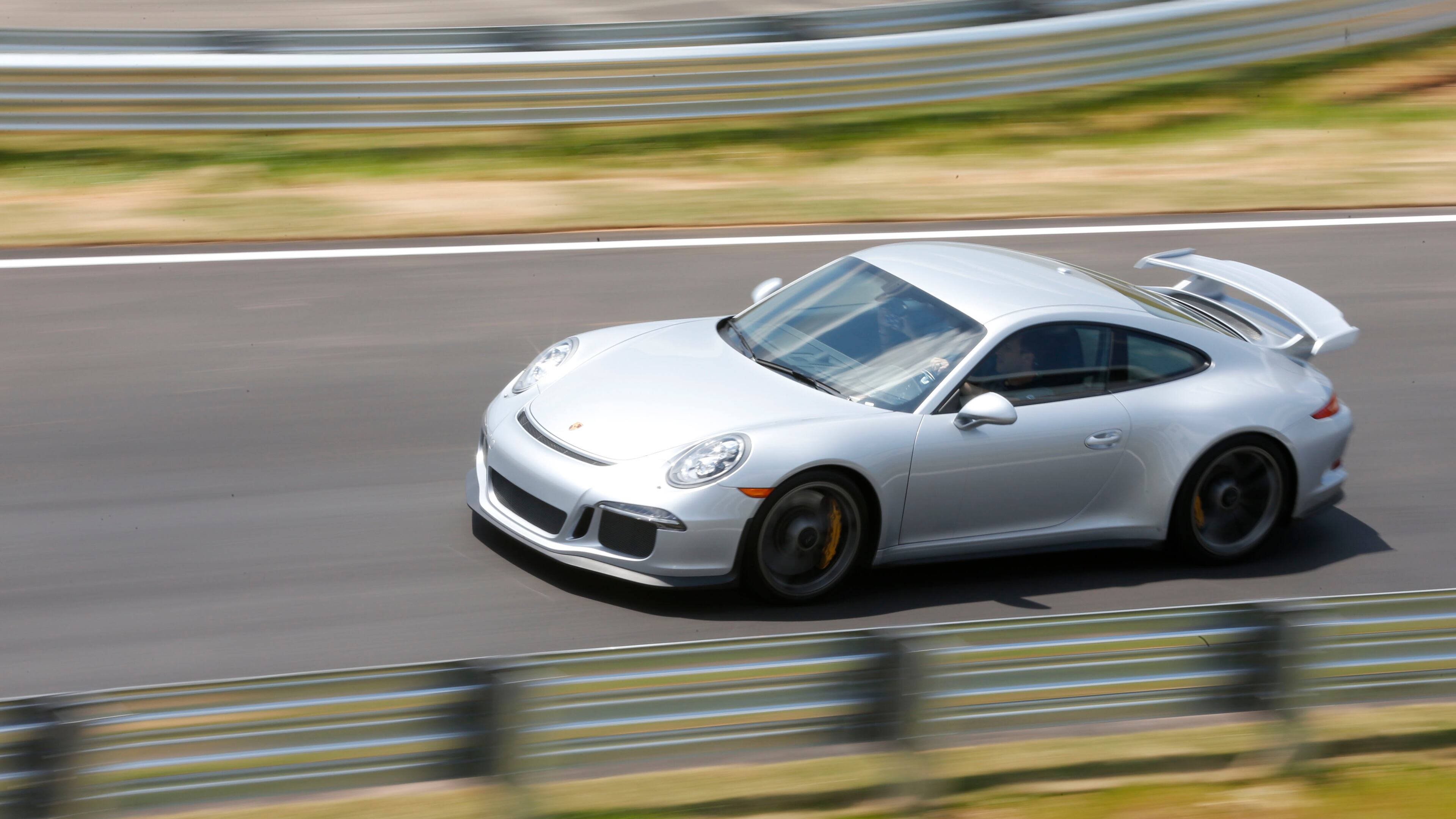 The Porsche Experience includes rides on their test track. BOB ANDRES / BANDRES@AJC.COM