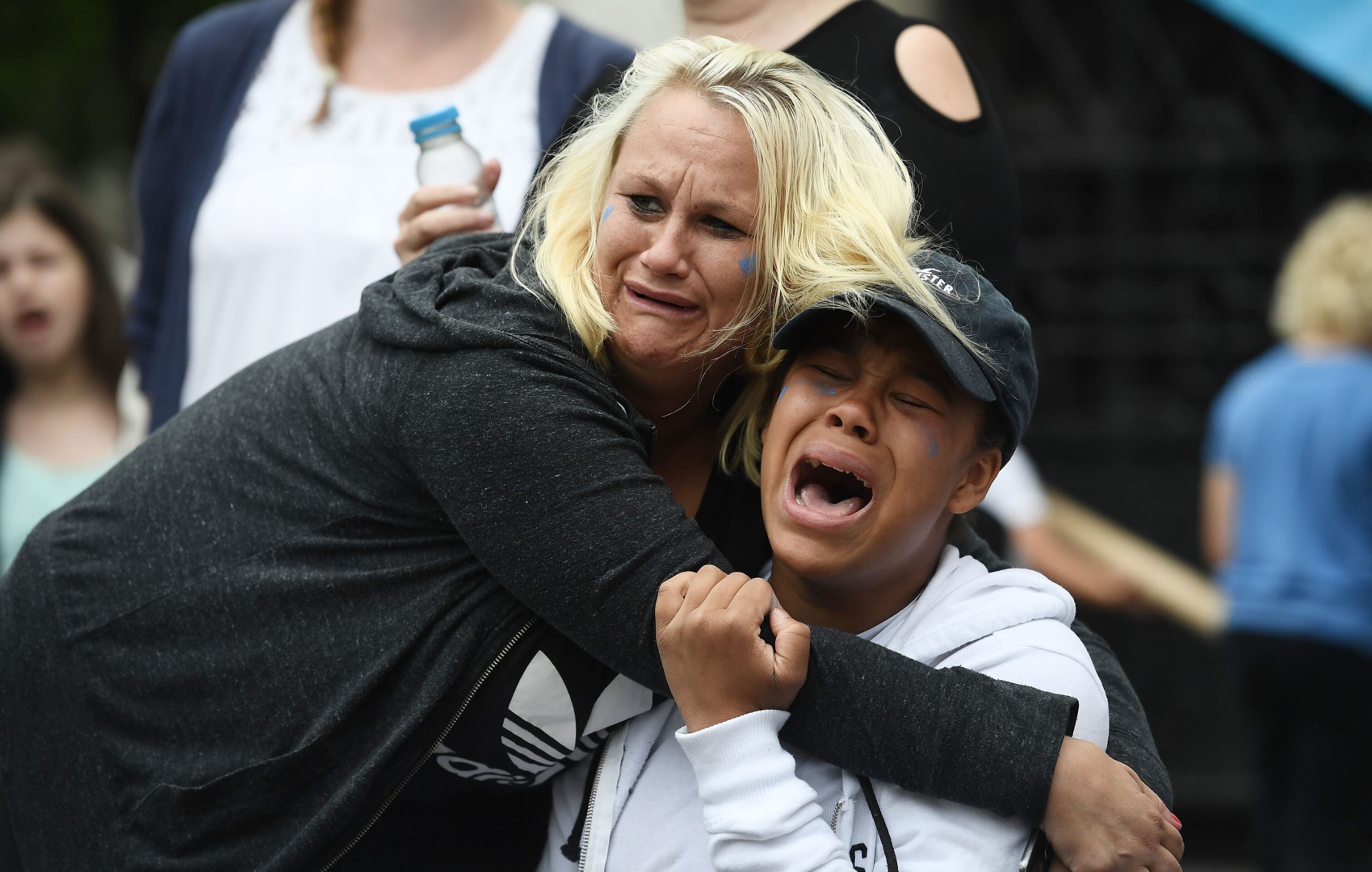 LONDON, ENGLAND - JULY 24: Supporters of of terminally ill baby Charlie Gard protest outside the High Court after the verdict was announced on July 24, 2017 in London, England. The five-month legal battle over Charlie Gard's future treatment ended after a US neurologist said that it was now too late to give him treatment. (Photo by Carl Court/Getty Images)