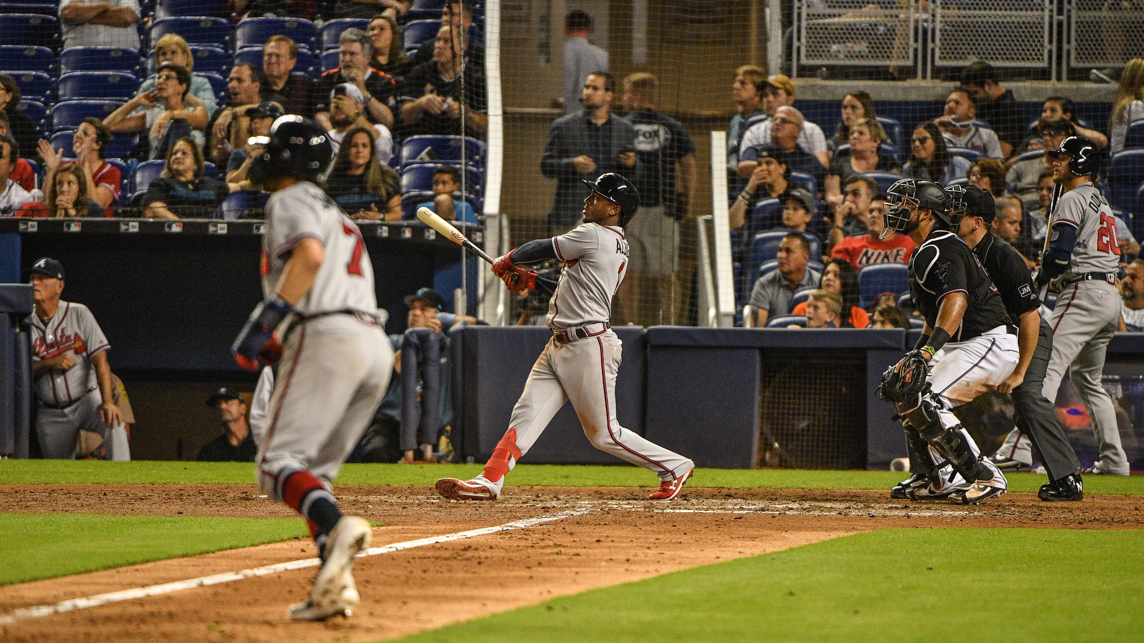 Ozzie Albies of the Braves hits a grand slam in the sixth inning against the Miami Marlins at Marlins Park on May 4, 2019 in Miami, Florida. (Photo by Mark Brown/Getty Images)