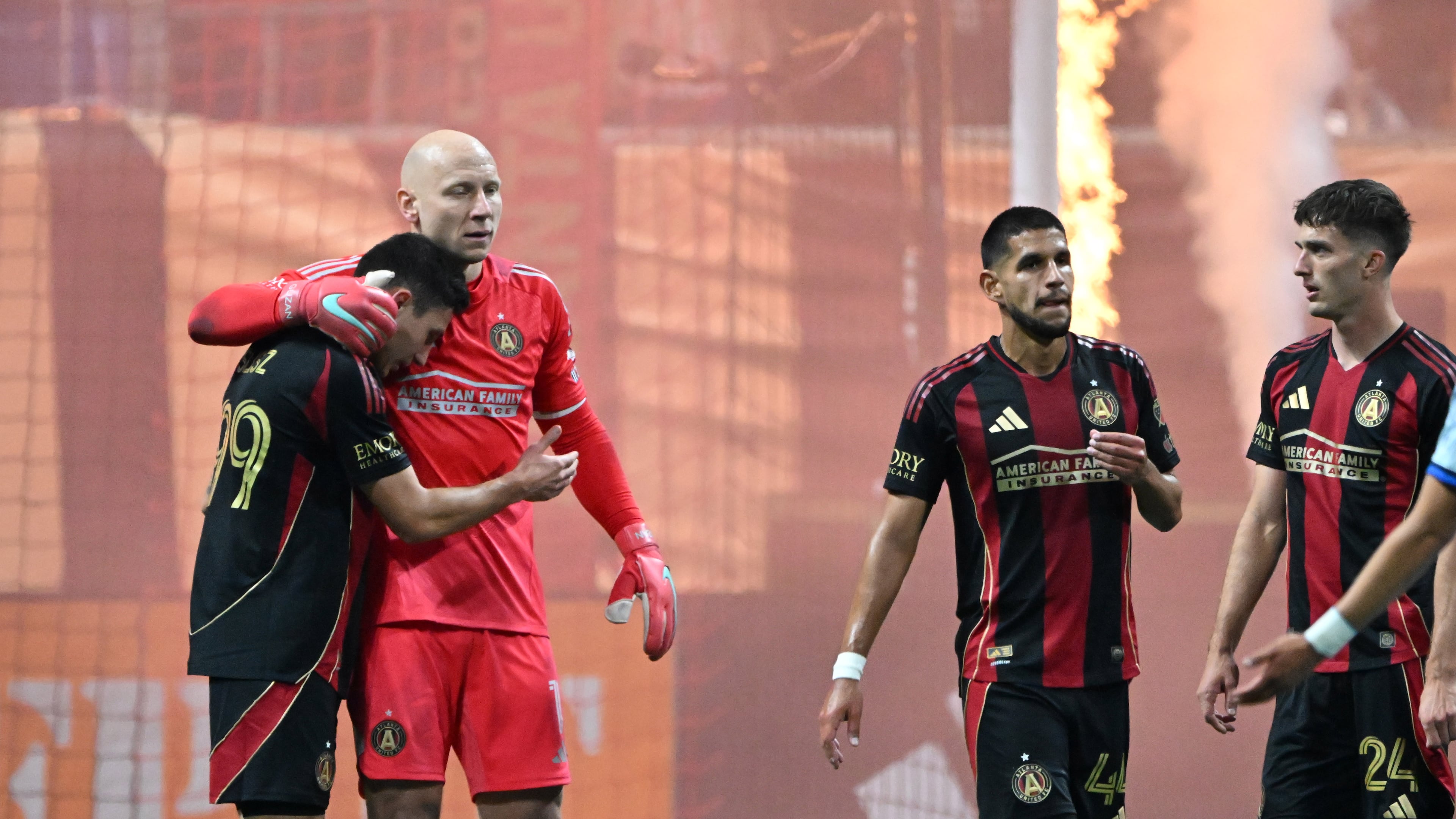 Atlanta United players celebrate at the end of the second half of Atlanta United’s MLS season opener at Mercedes-Benz Stadium, Saturday, February 22, 2025, in Atlanta. Atlanta United won 3-2 over CF Montreal. (Hyosub Shin / AJC)