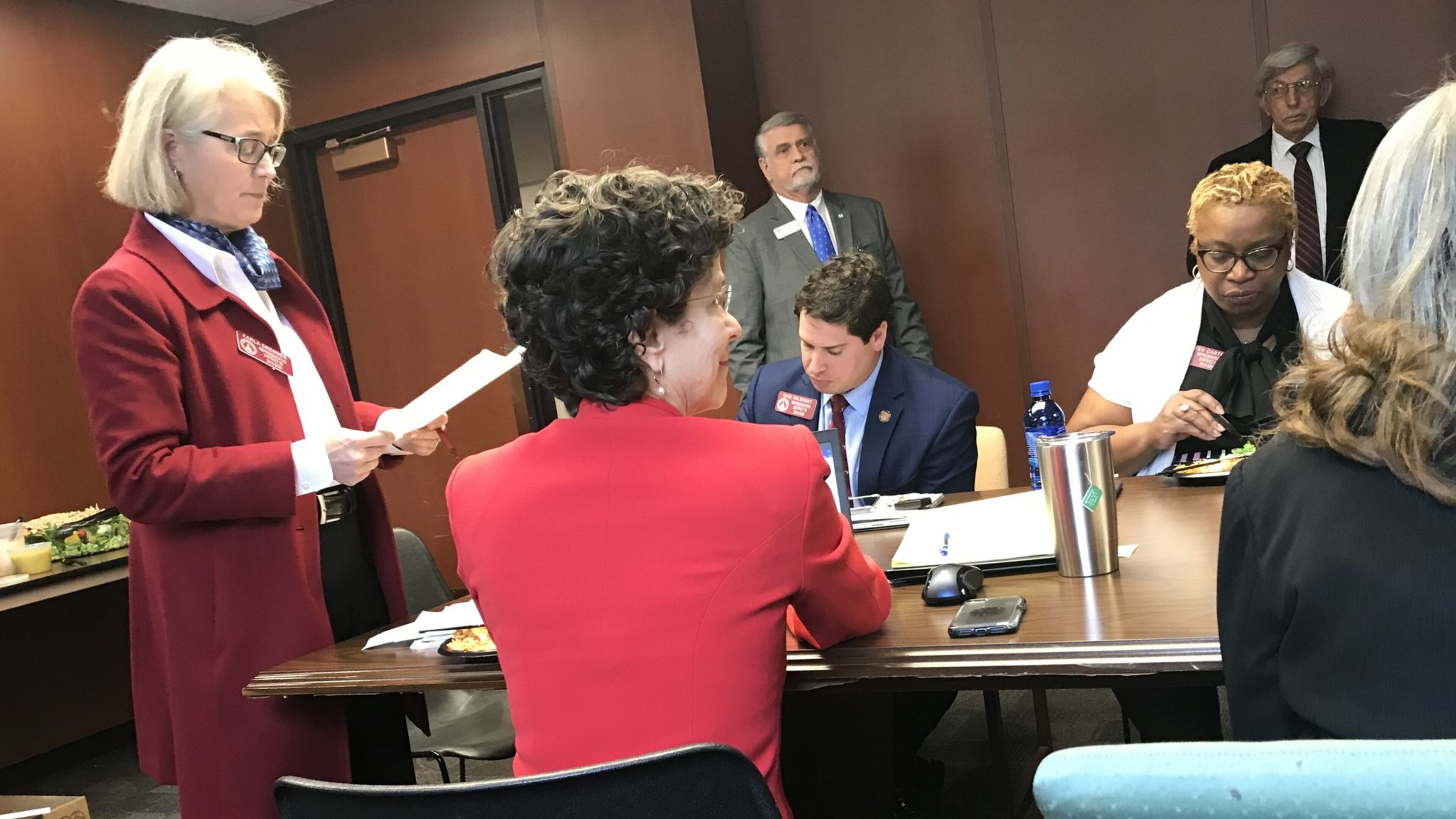 DeKalb House delegation chair Rep. Karla Drenner, left, speaks during a meeting Tuesday. TYLER ESTEP / TYLER.ESTEP@AJC.COM